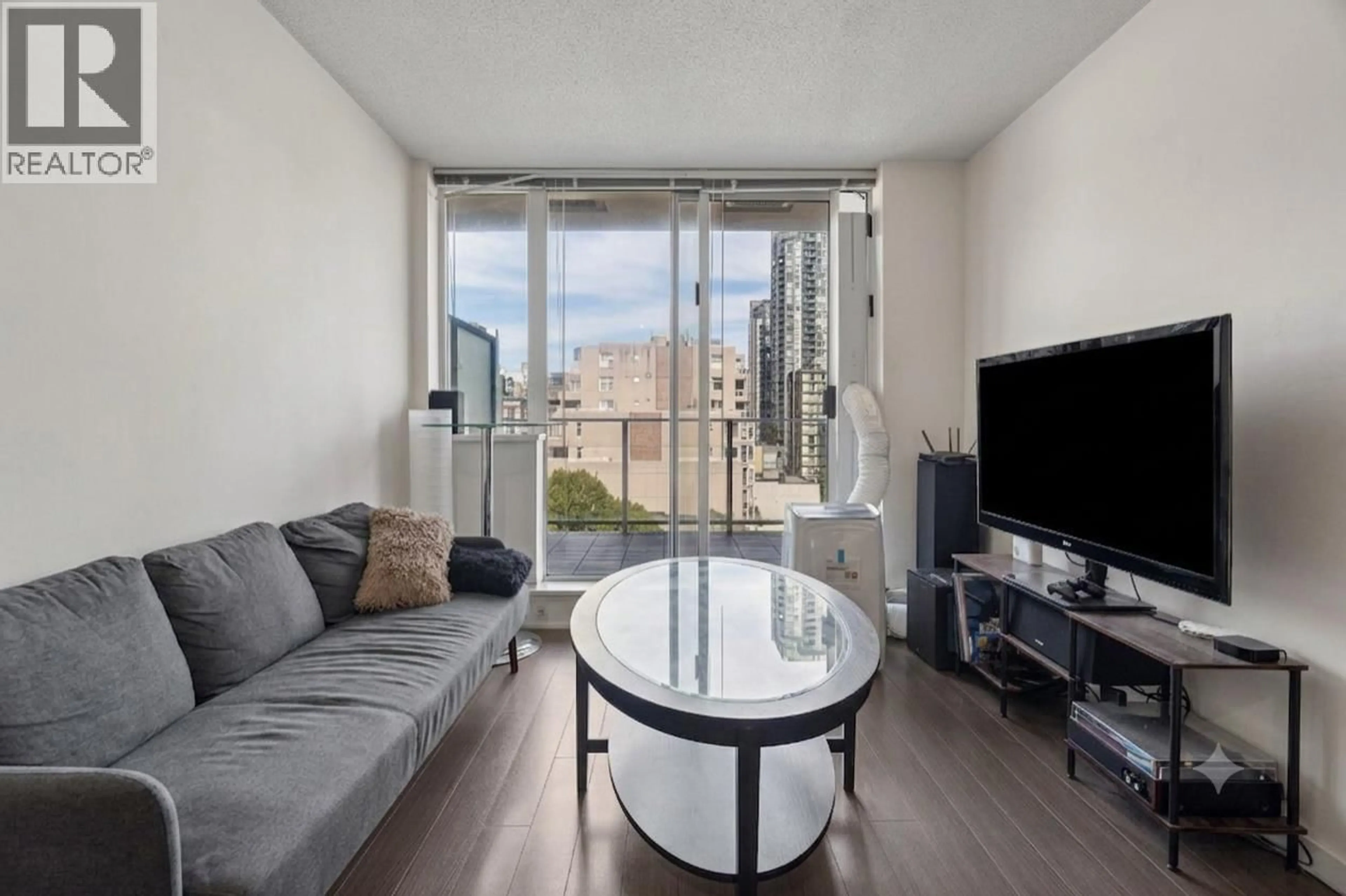 Living room with furniture, unknown for 703 - 1325 ROLSTON STREET, Vancouver British Columbia V6B0M2