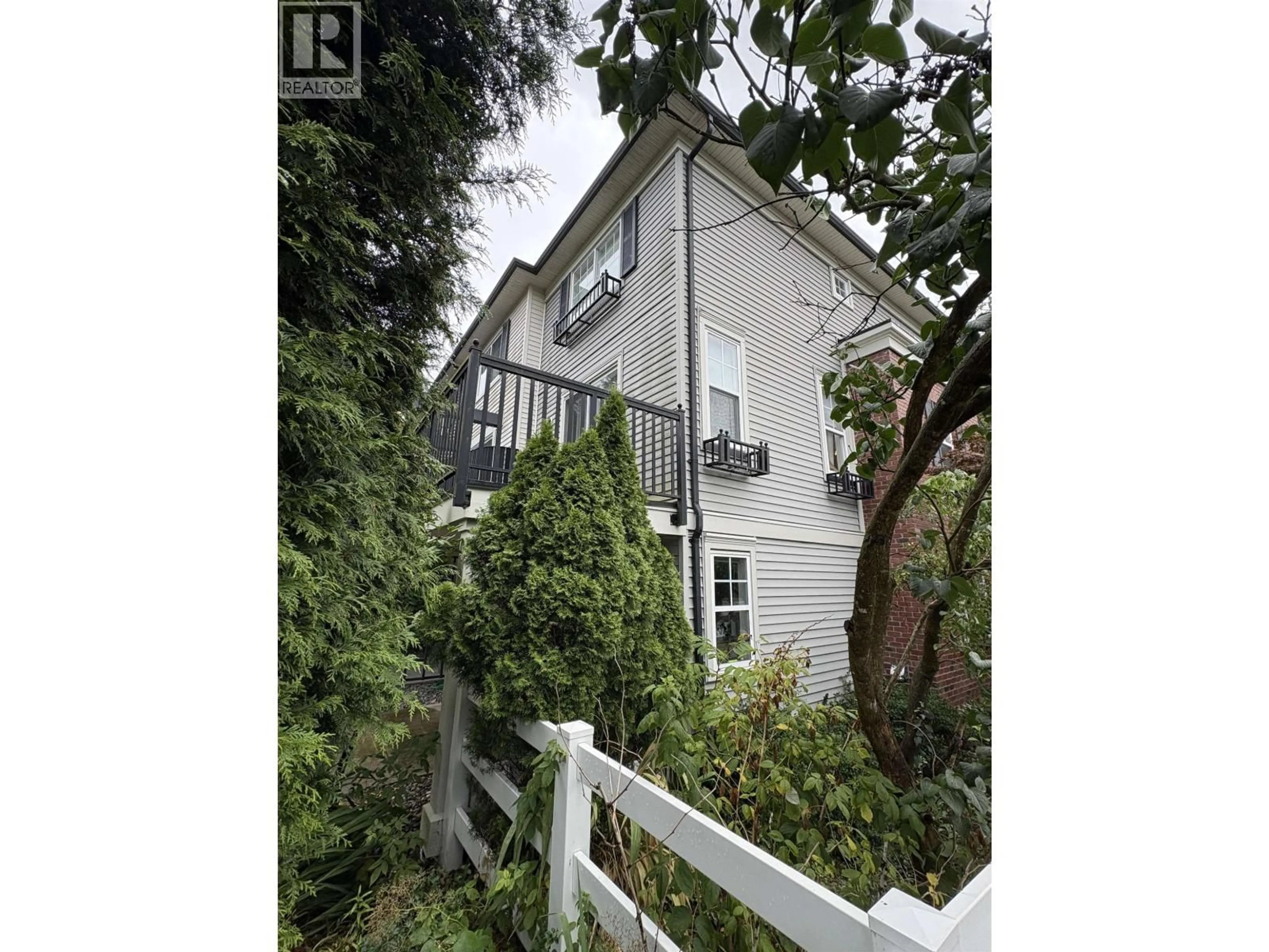 A pic from outside/outdoor area/front of a property/back of a property/a pic from drone, street for 11 - 2495 DAVIES AVENUE, Port Coquitlam British Columbia V3C0B2