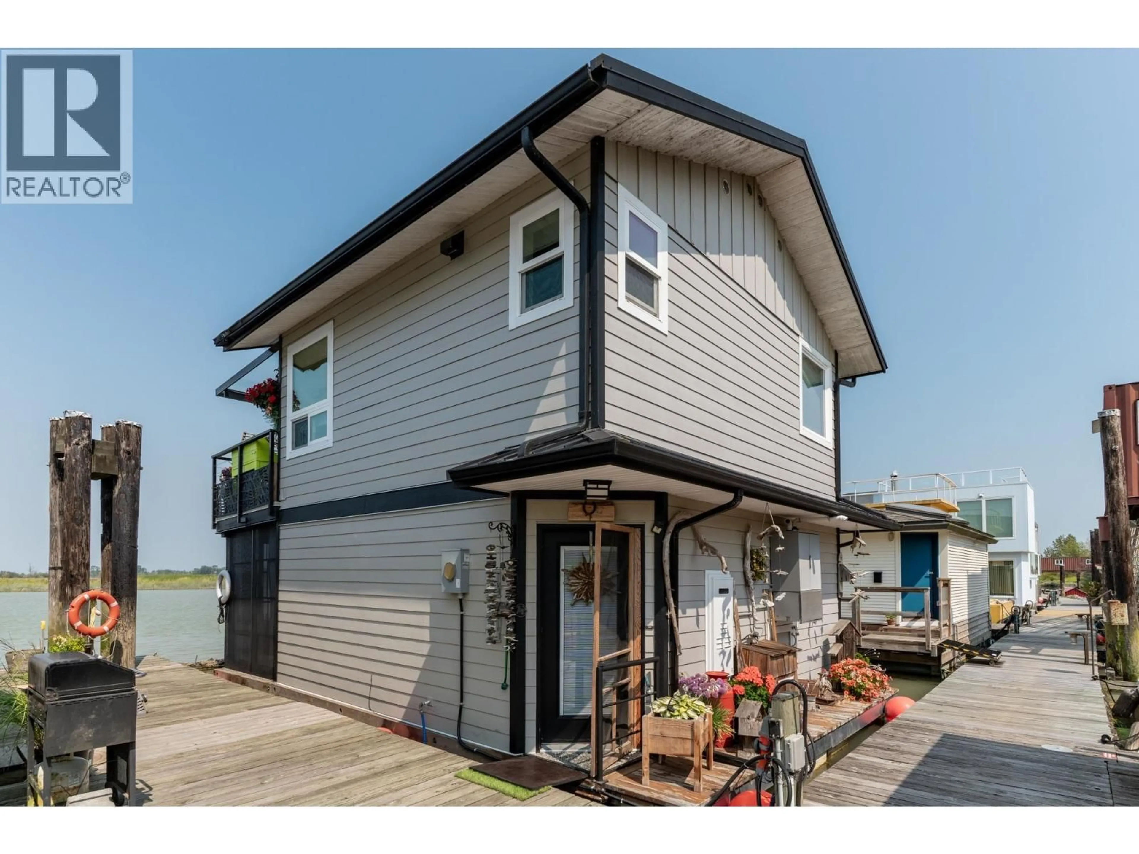 Home with vinyl exterior material, water/lake/river/ocean view for 14 - 3871 RIVER ROAD ROAD, Delta British Columbia V4K5E9
