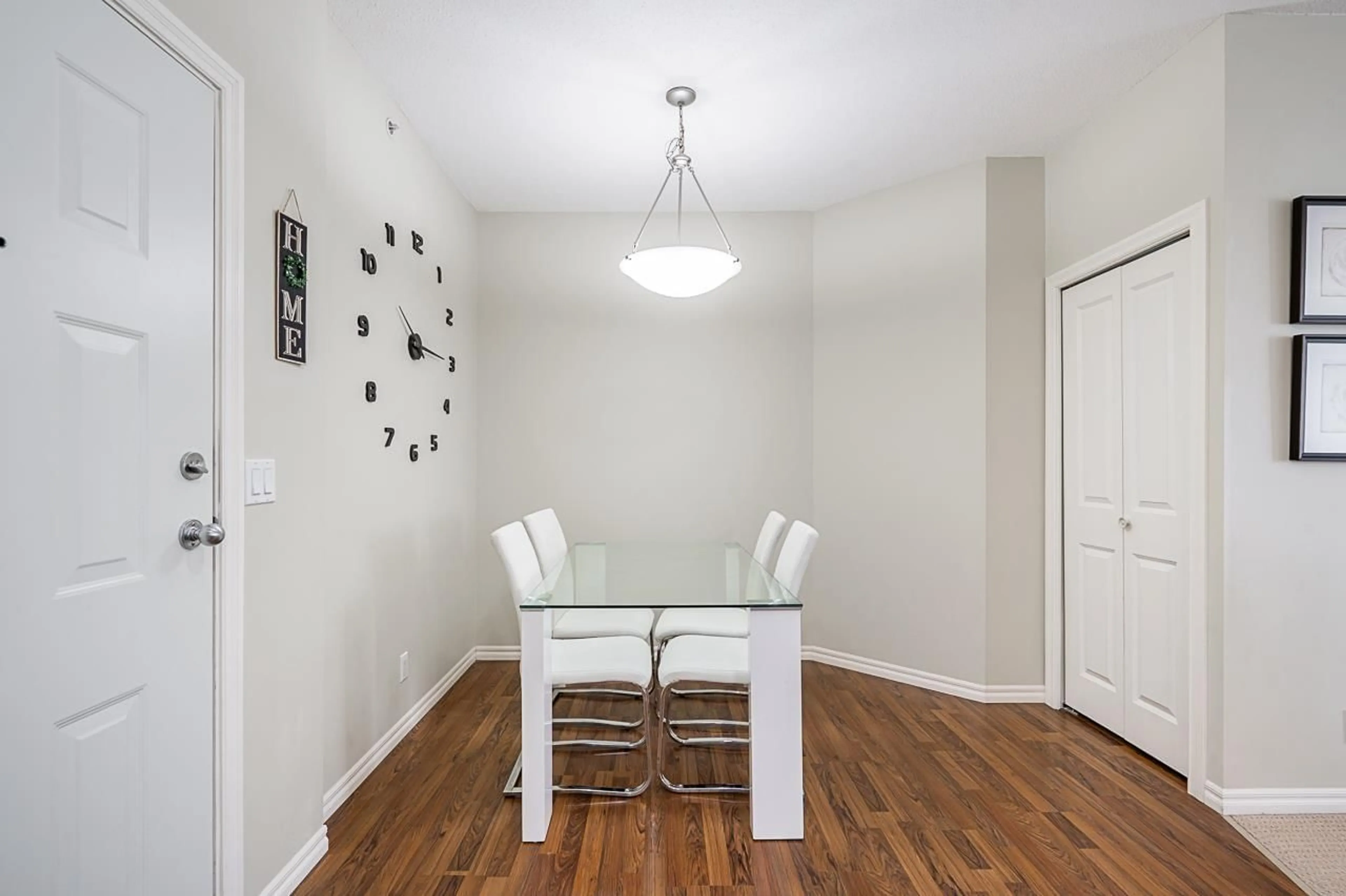 Dining room, wood/laminate floor for 408 - 2581 LANGDON STREET, Abbotsford British Columbia V2T7A3