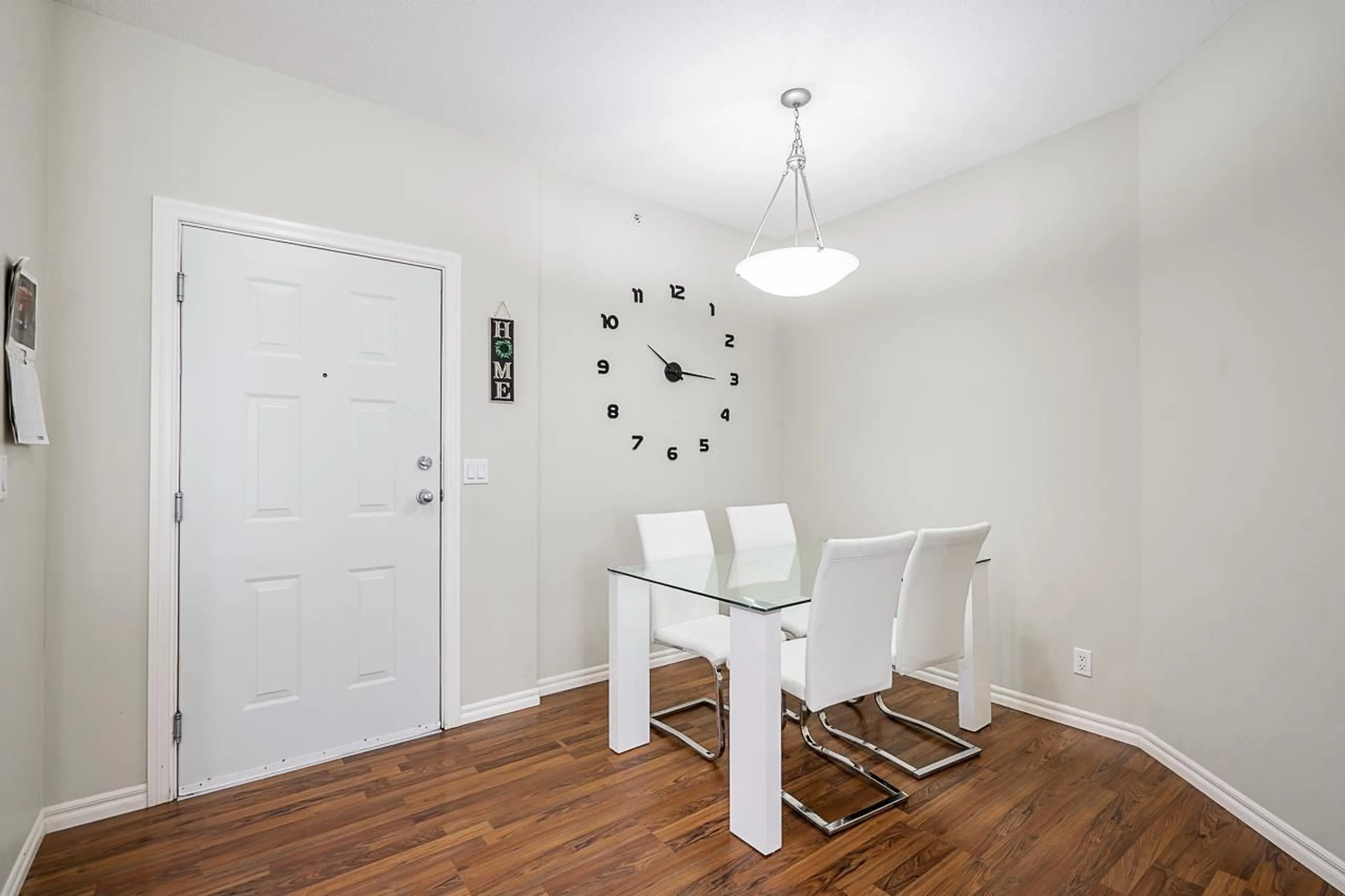 Dining room, wood/laminate floor for 408 - 2581 LANGDON STREET, Abbotsford British Columbia V2T7A3