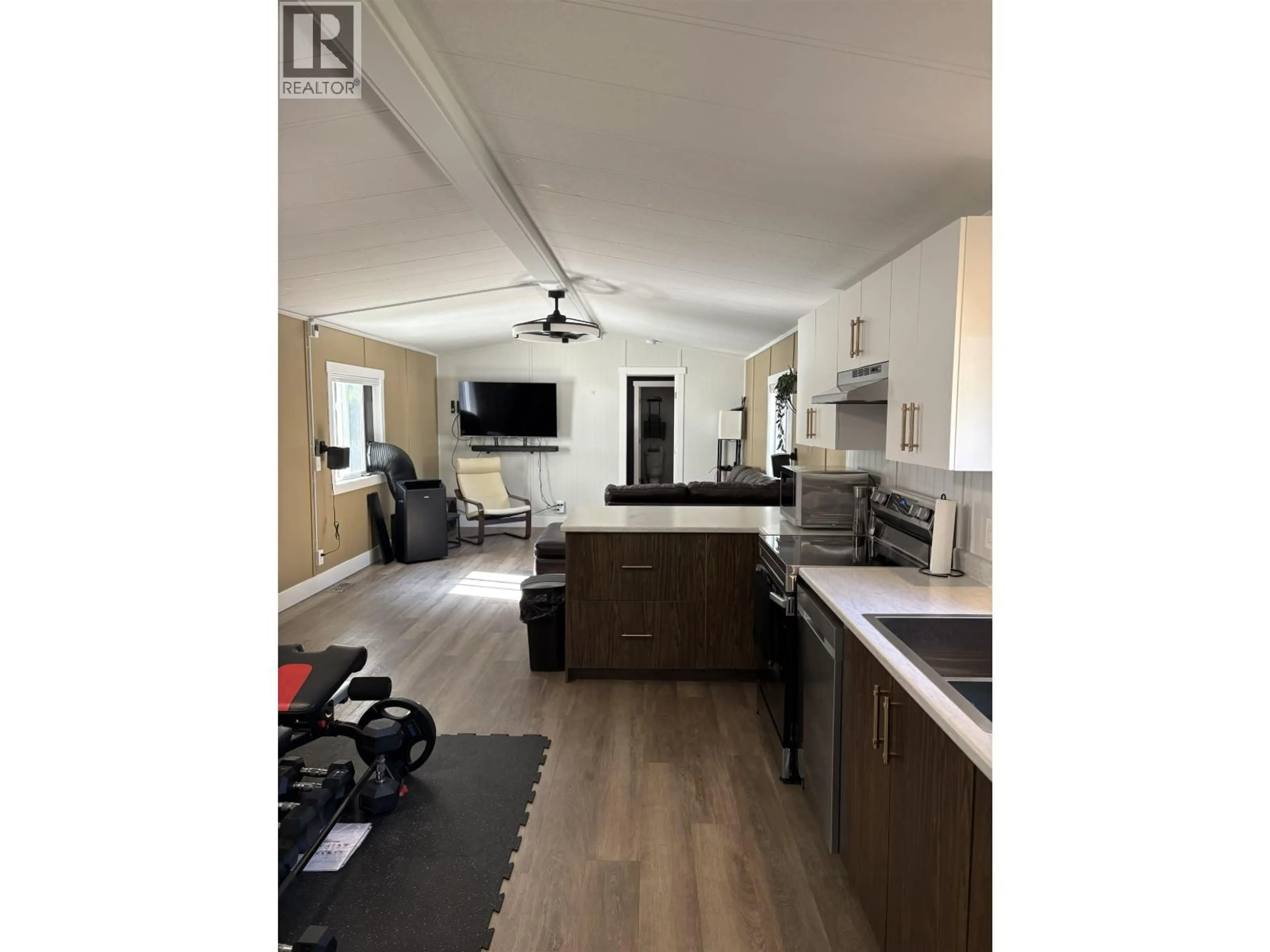 Open concept kitchen, wood/laminate floor for 4 - 1000 INVERNESS ROAD, Prince George British Columbia V2K4V1