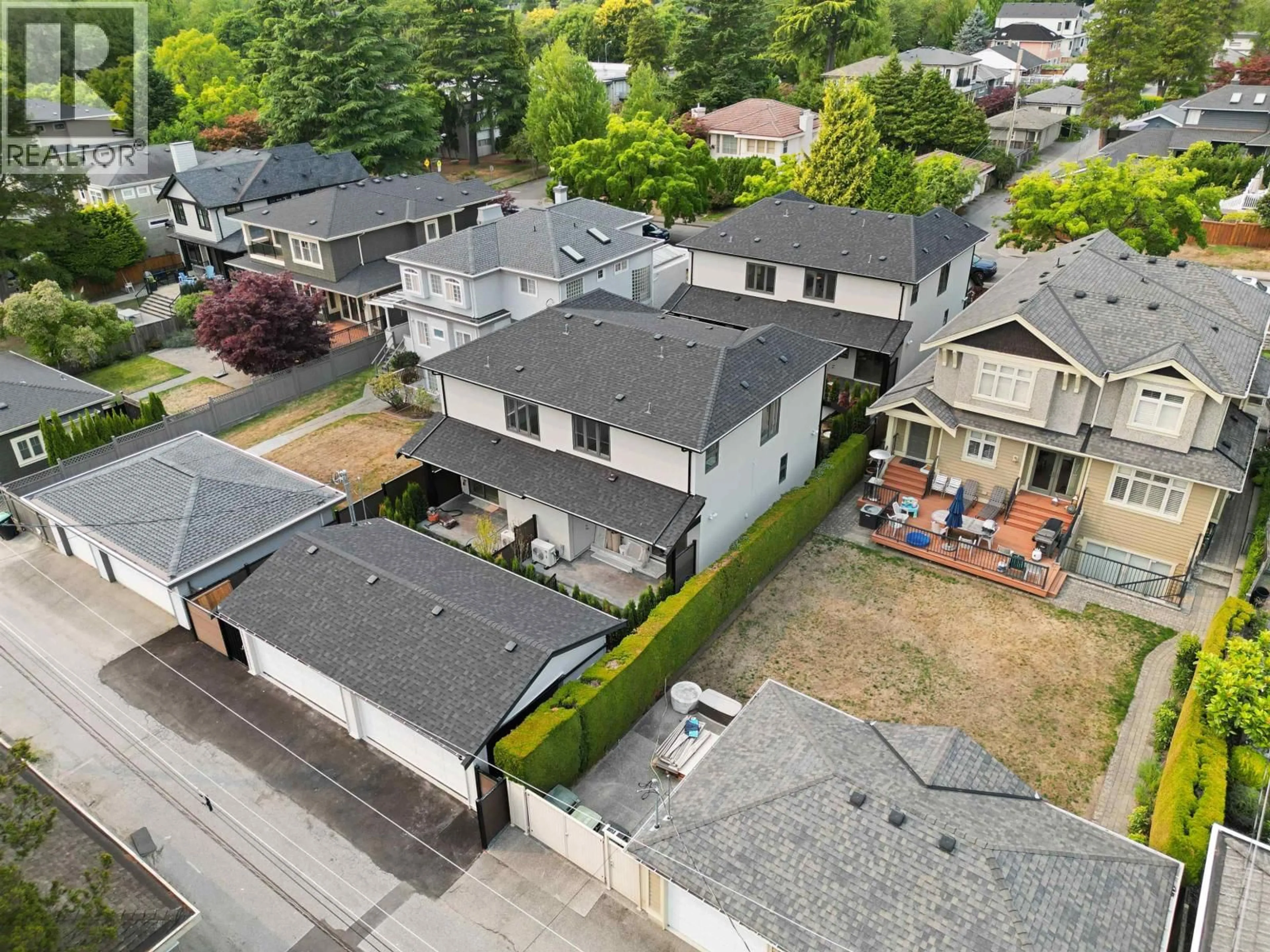 A pic from outside/outdoor area/front of a property/back of a property/a pic from drone, street for 2 - 1958 60TH AVENUE, Vancouver British Columbia V6P2B1