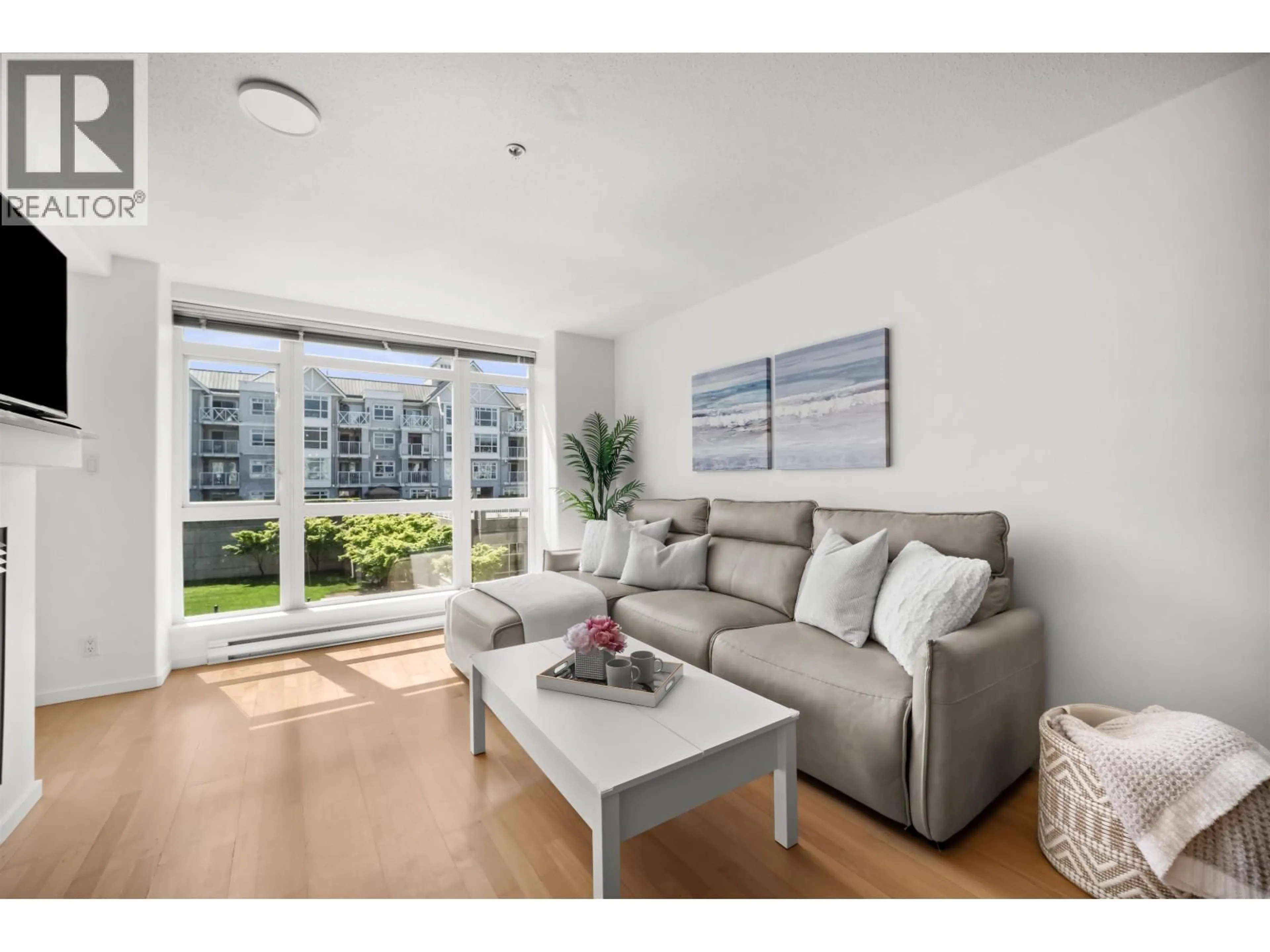 Living room with furniture, wood/laminate floor for 302 - 3142 ST JOHNS STREET, Port Moody British Columbia V3H5E5