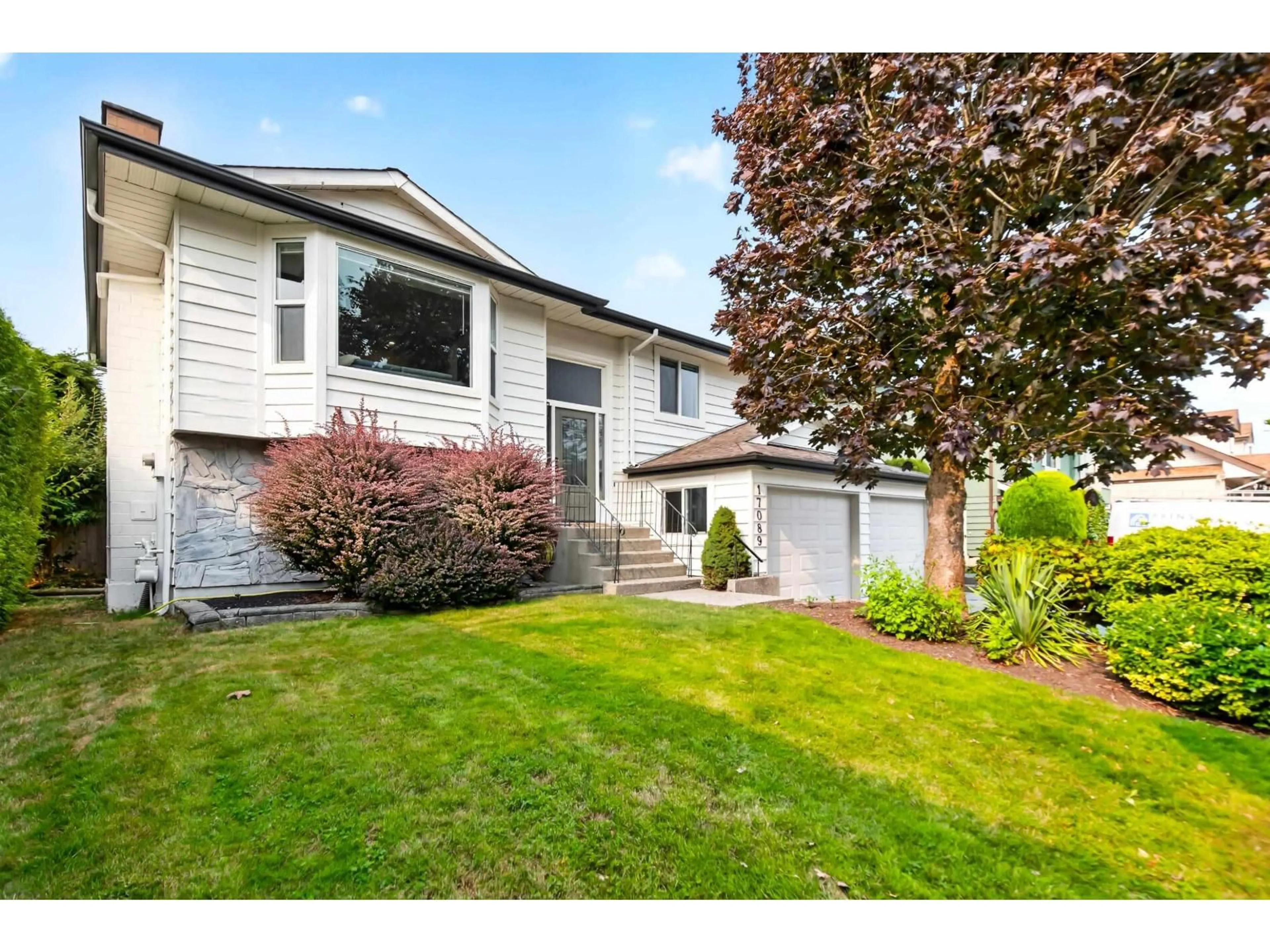 Home with vinyl exterior material, street for 17089 60A AVENUE, Surrey British Columbia V3S6A7