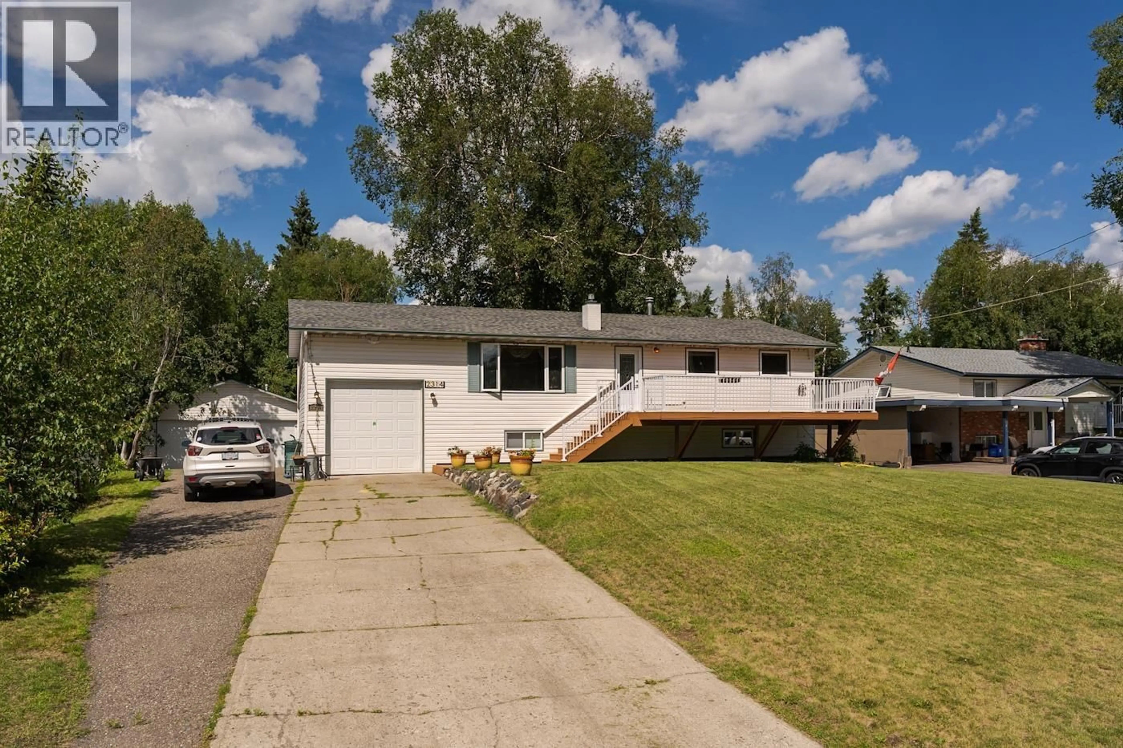 Home with vinyl exterior material, street for 2314 GLENNGARRY ROAD, Prince George British Columbia V2K3E8