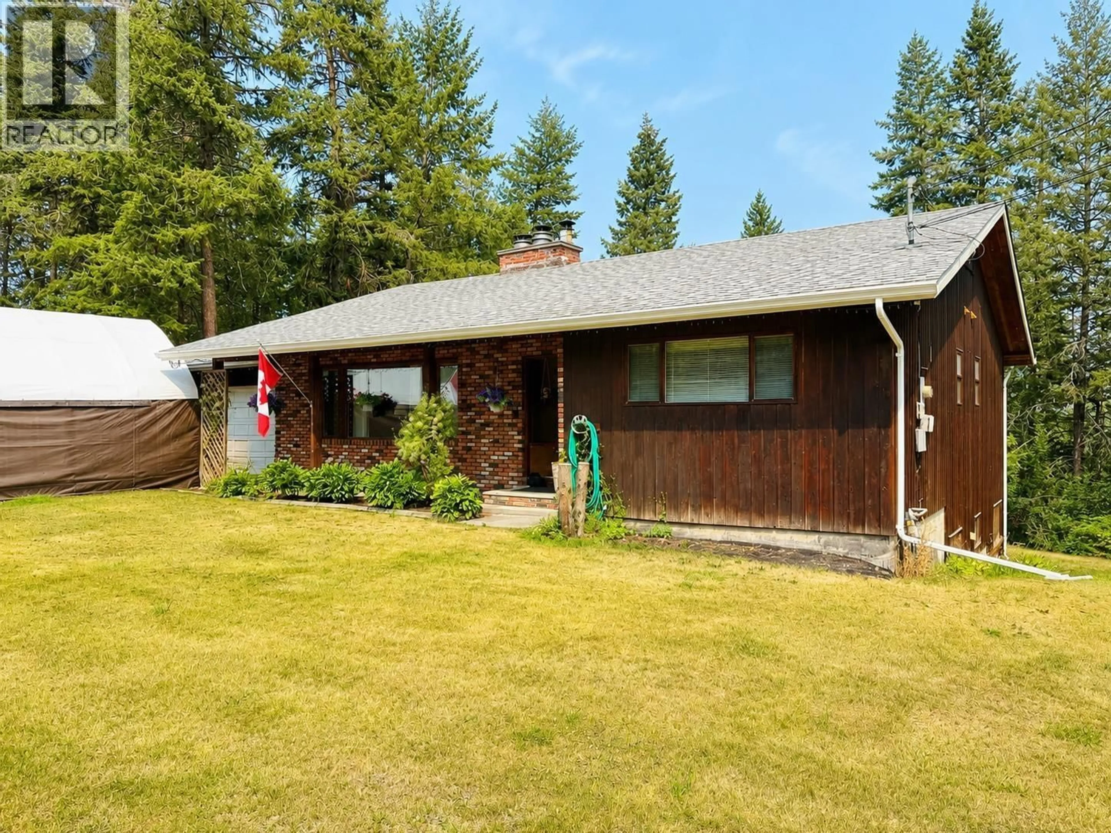 A pic from outside/outdoor area/front of a property/back of a property/a pic from drone, street for 816 ROBERTS DRIVE, Esler / Dog Creek British Columbia V2G3K8