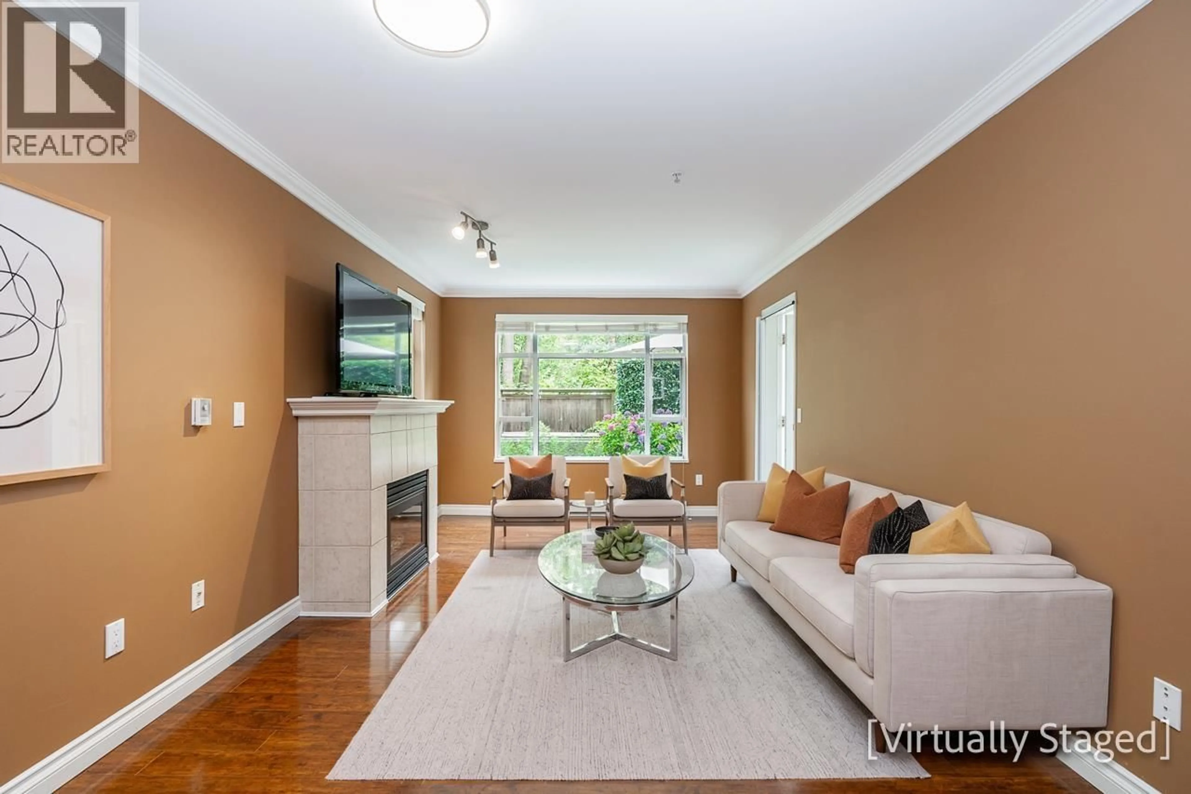 Living room with furniture, unknown for 103 - 3625 WINDCREST DRIVE, North Vancouver British Columbia V7G2S6