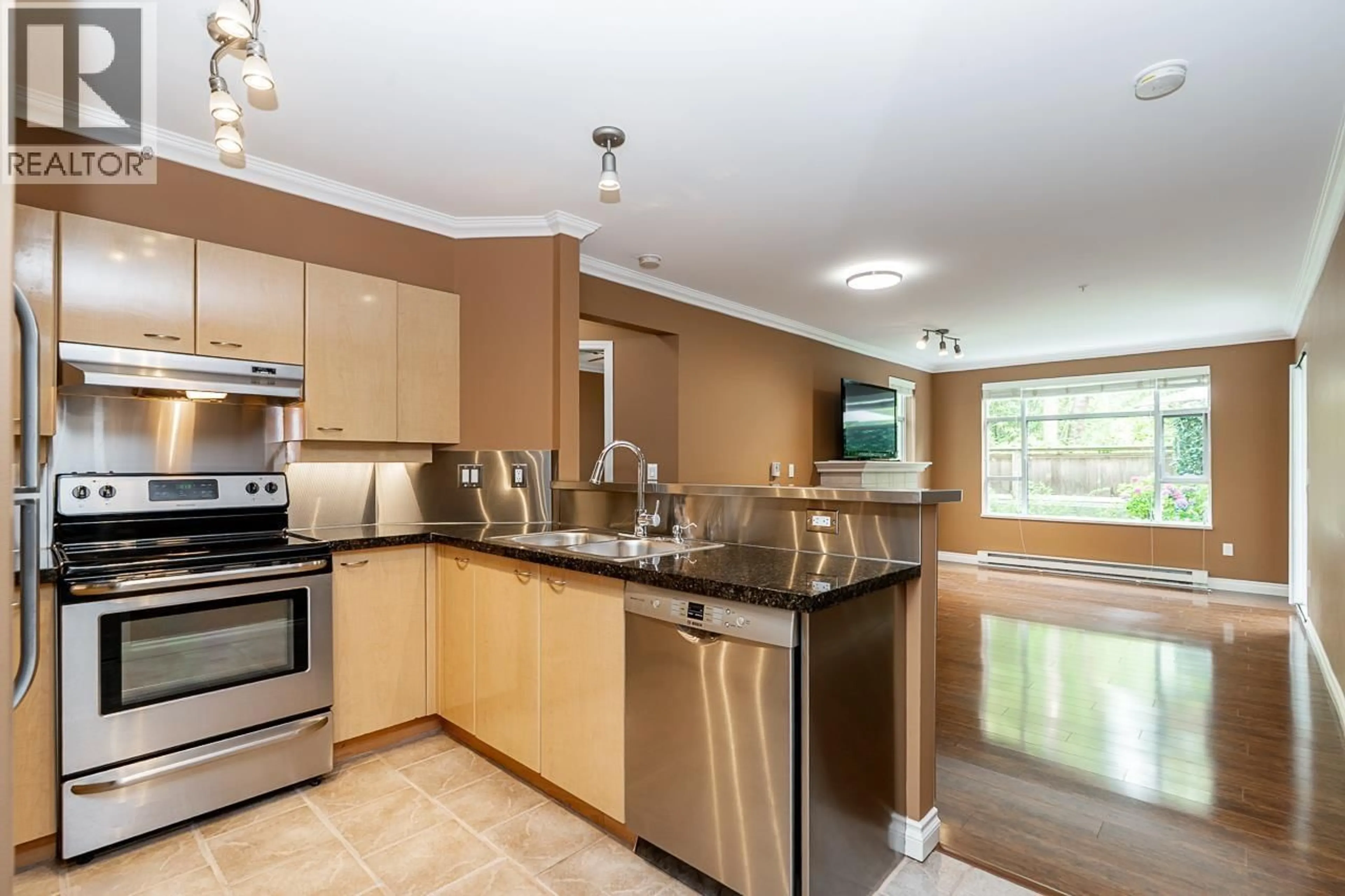 Open concept kitchen, ceramic/tile floor for 103 - 3625 WINDCREST DRIVE, North Vancouver British Columbia V7G2S6
