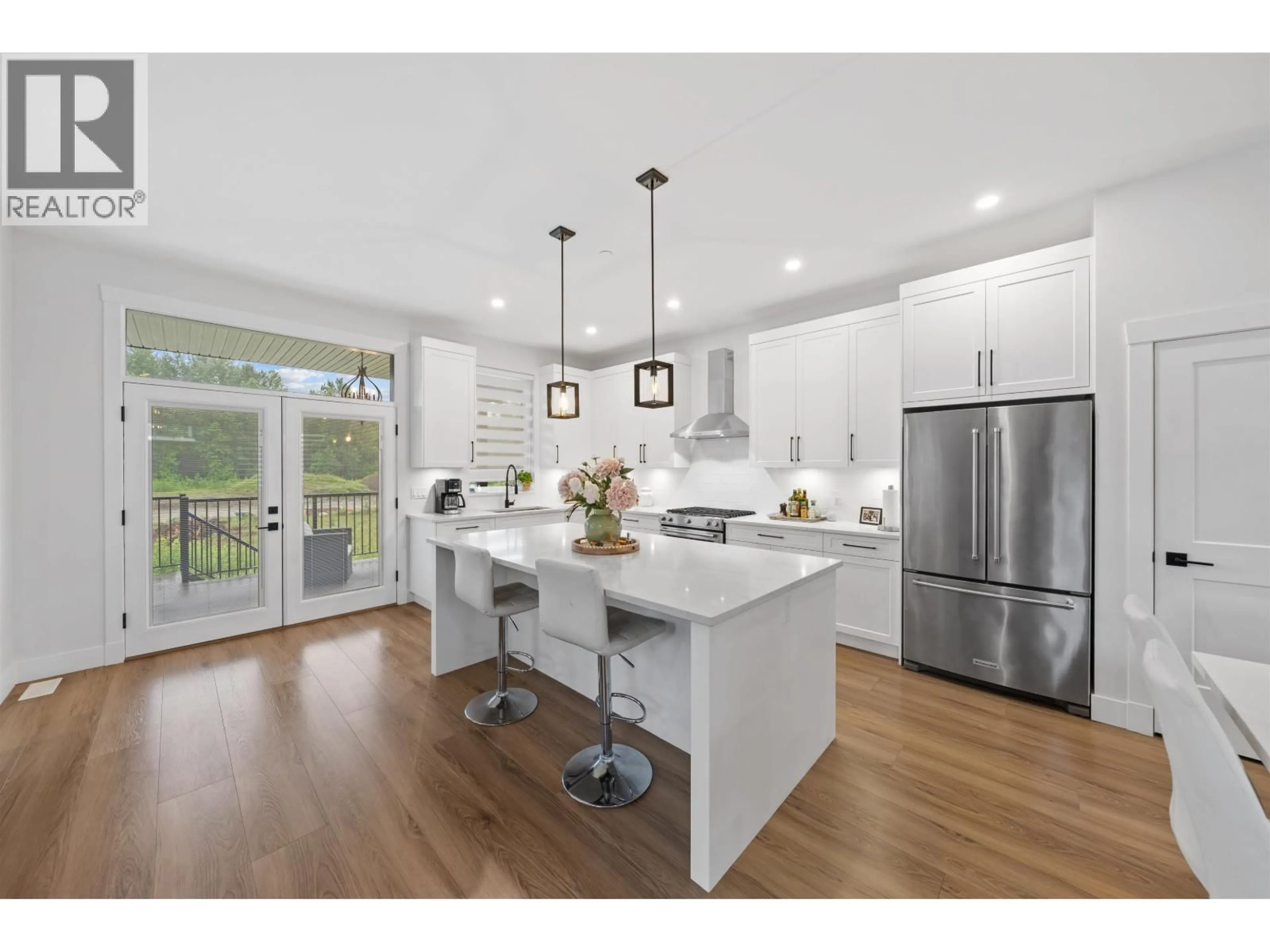 Open concept kitchen, wood/laminate floor for 13532 BIRDTAIL DRIVE, Maple Ridge British Columbia V4R0J2