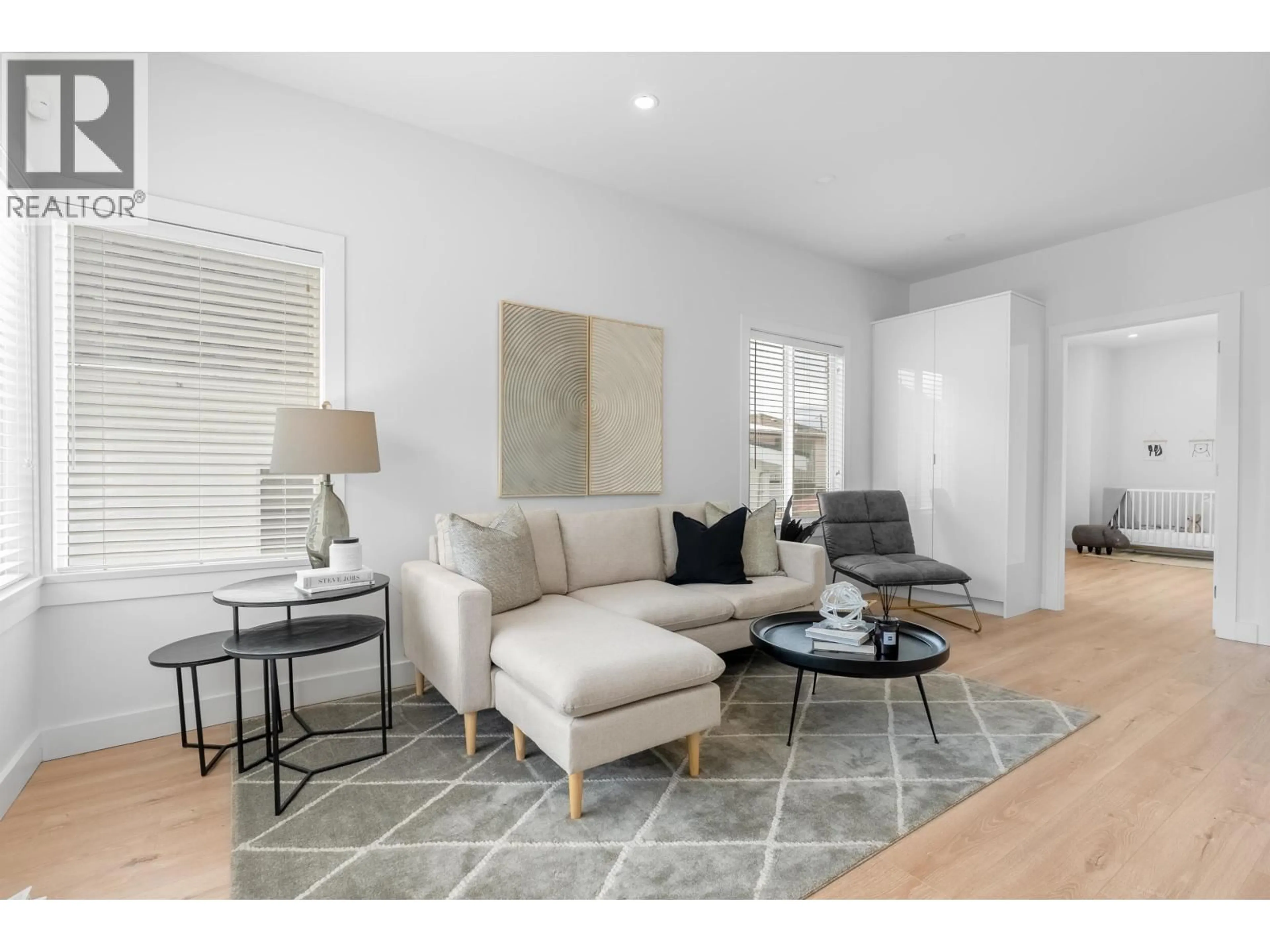 Living room with furniture, wood/laminate floor for 2617 TURNER STREET, Vancouver British Columbia V5K2G1