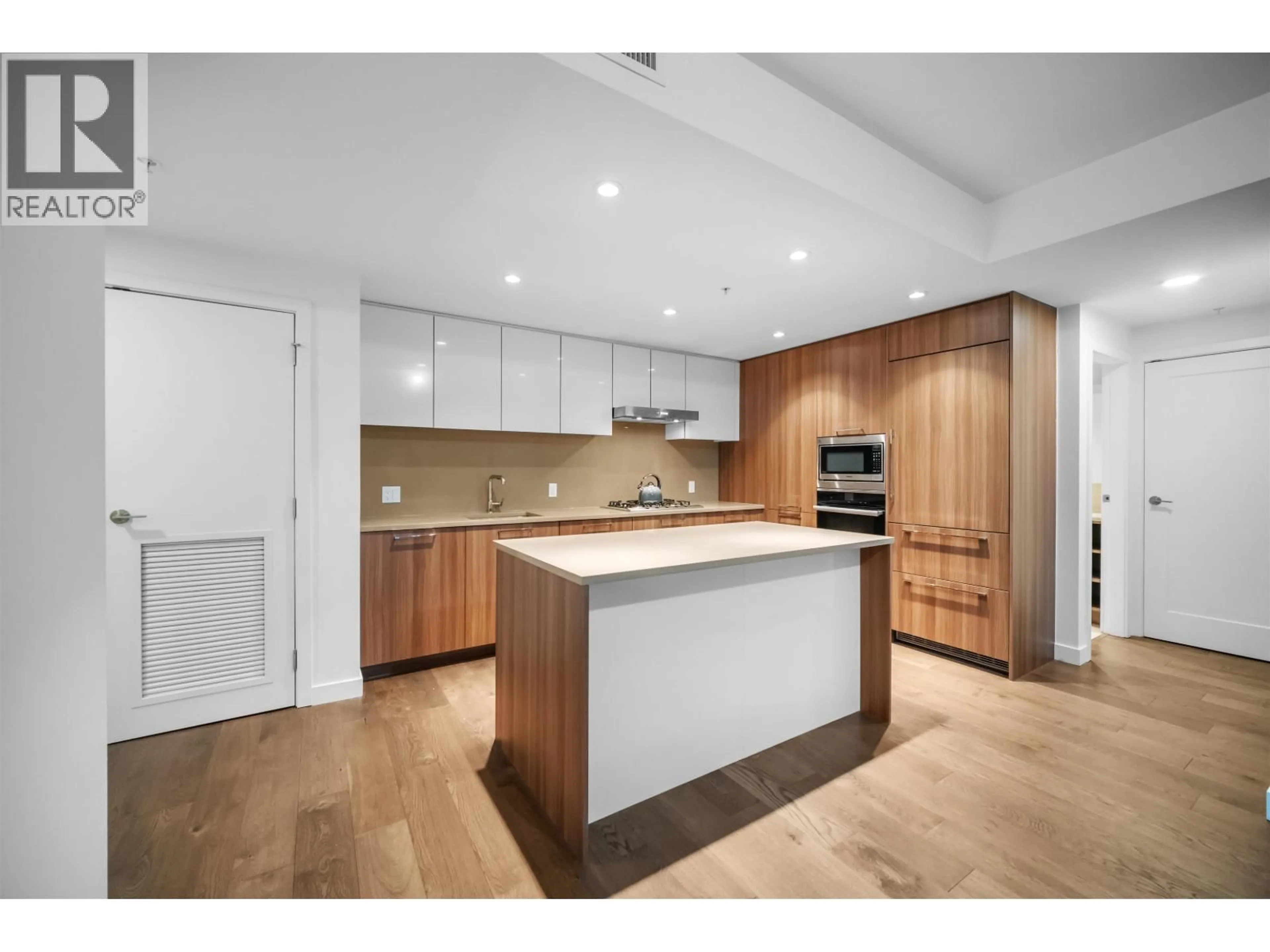 Open concept kitchen, wood/laminate floor for 802 - 3331 NO 3 ROAD, Richmond British Columbia V6X2B6