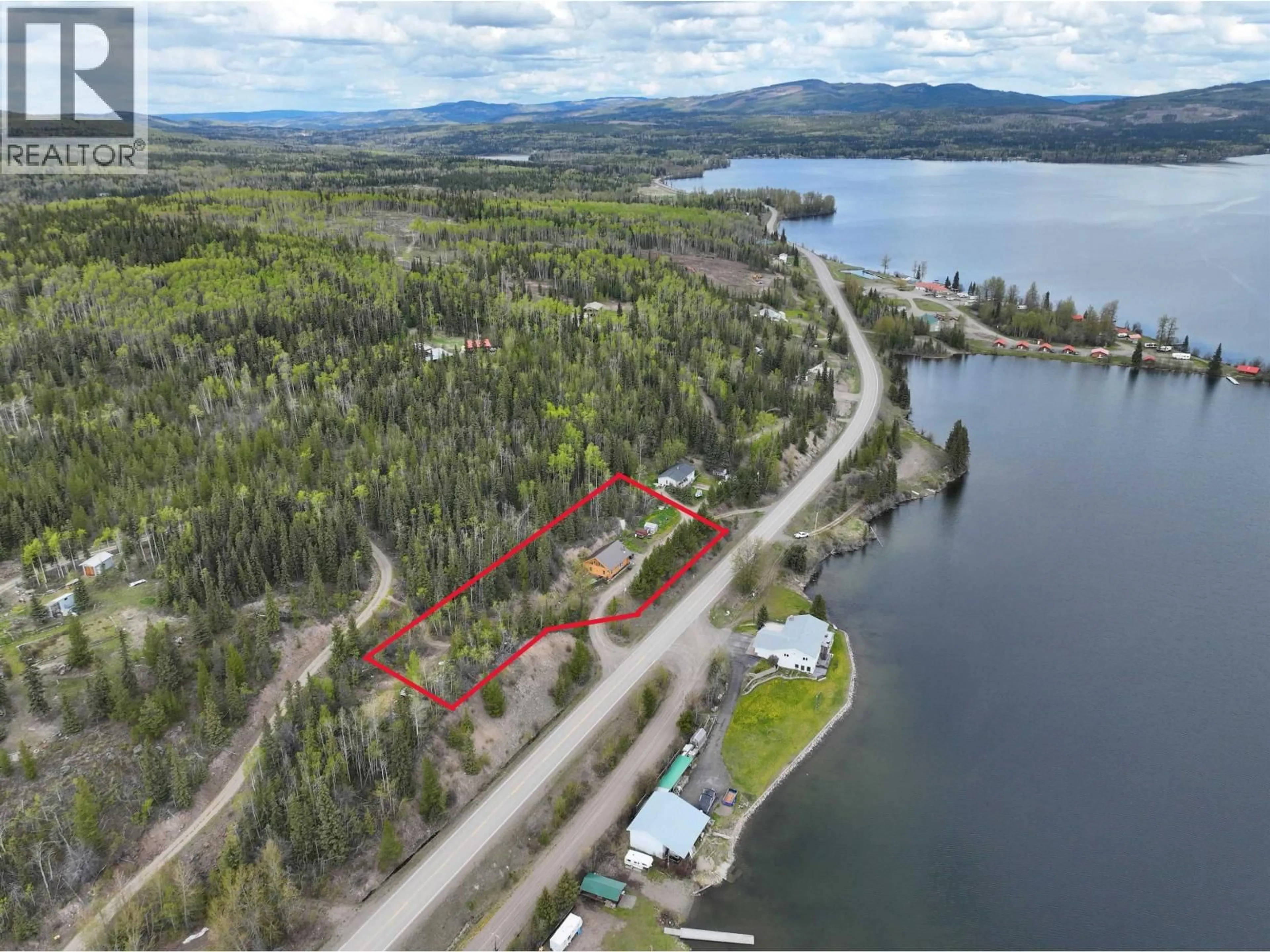 A pic from outside/outdoor area/front of a property/back of a property/a pic from drone, water/lake/river/ocean view for 17025 35 HIGHWAY, Burns Lake British Columbia V0J1E2