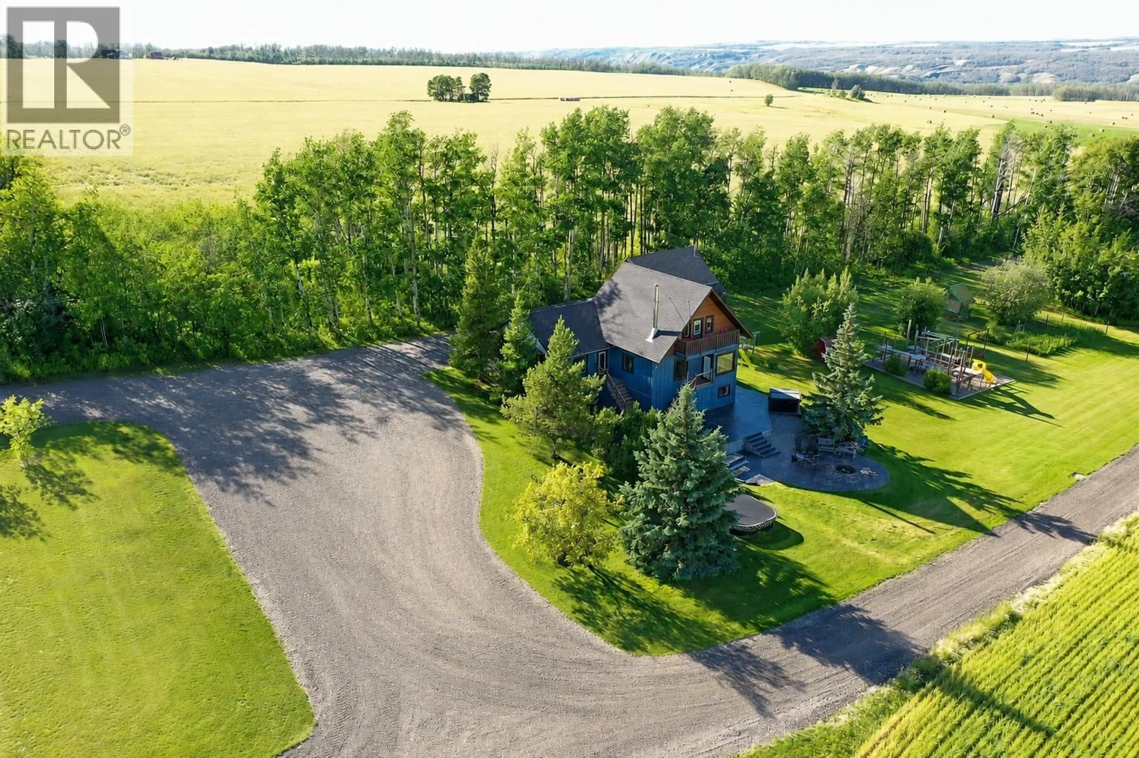 A pic from outside/outdoor area/front of a property/back of a property/a pic from drone, unknown for 5294 242 ROAD, Fort St. John British Columbia V0C1C0