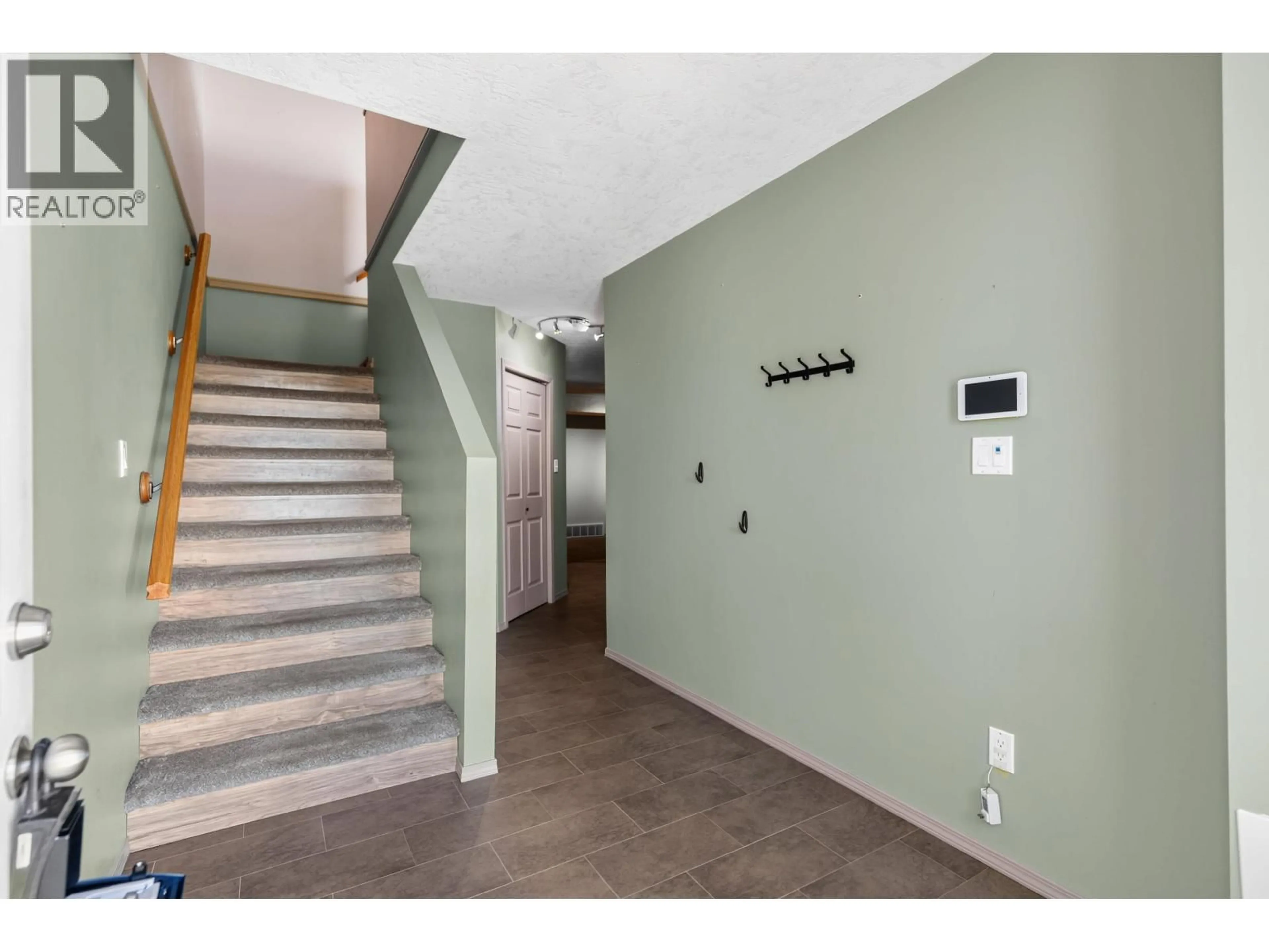 Indoor foyer for 104 - 6855 DOMANO BOULEVARD, Prince George British Columbia V2N5C9