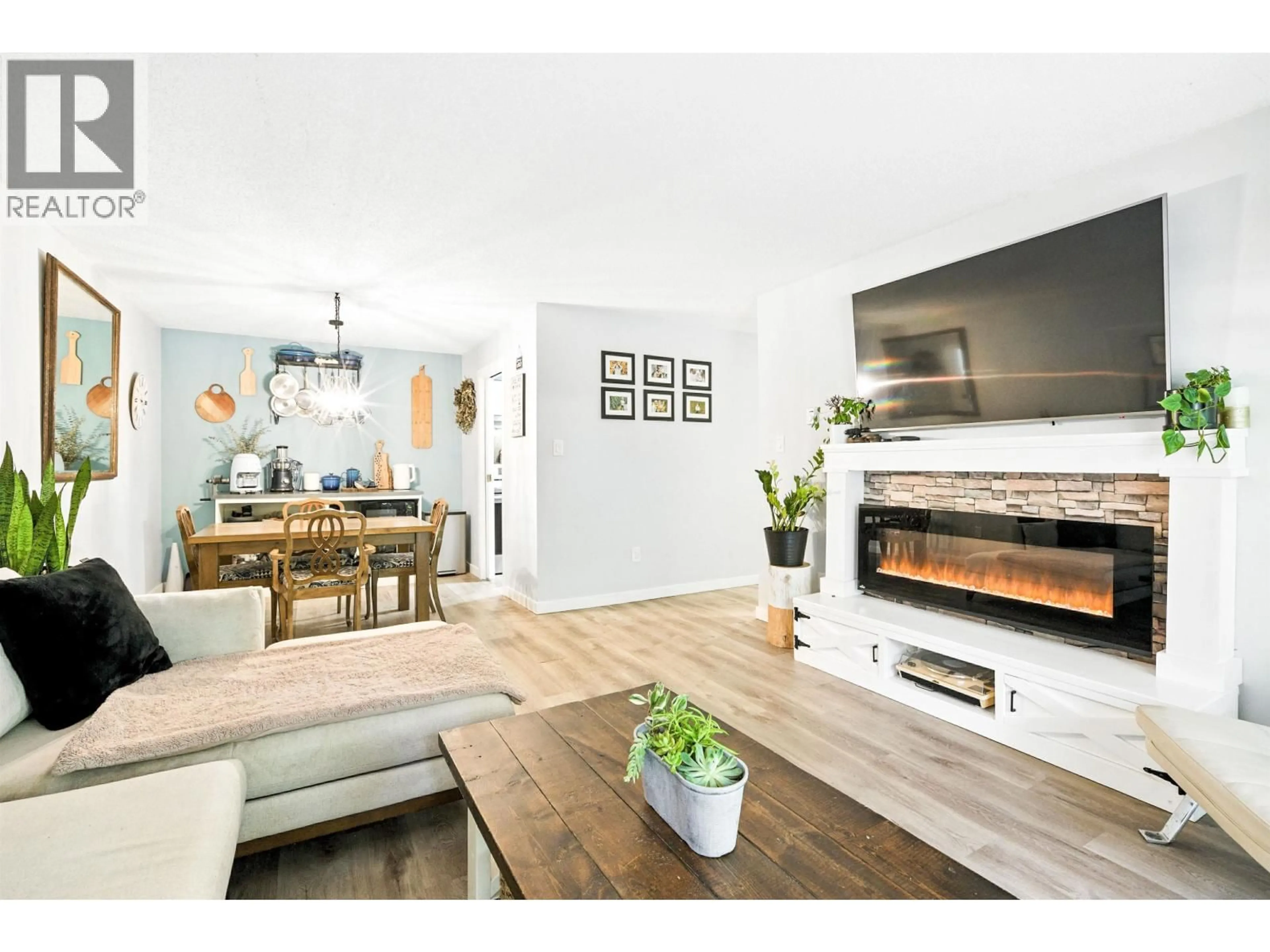 Open concept kitchen, wood/laminate floor for 212 - 1955 WOODWAY PLACE, Burnaby British Columbia V5B4S5