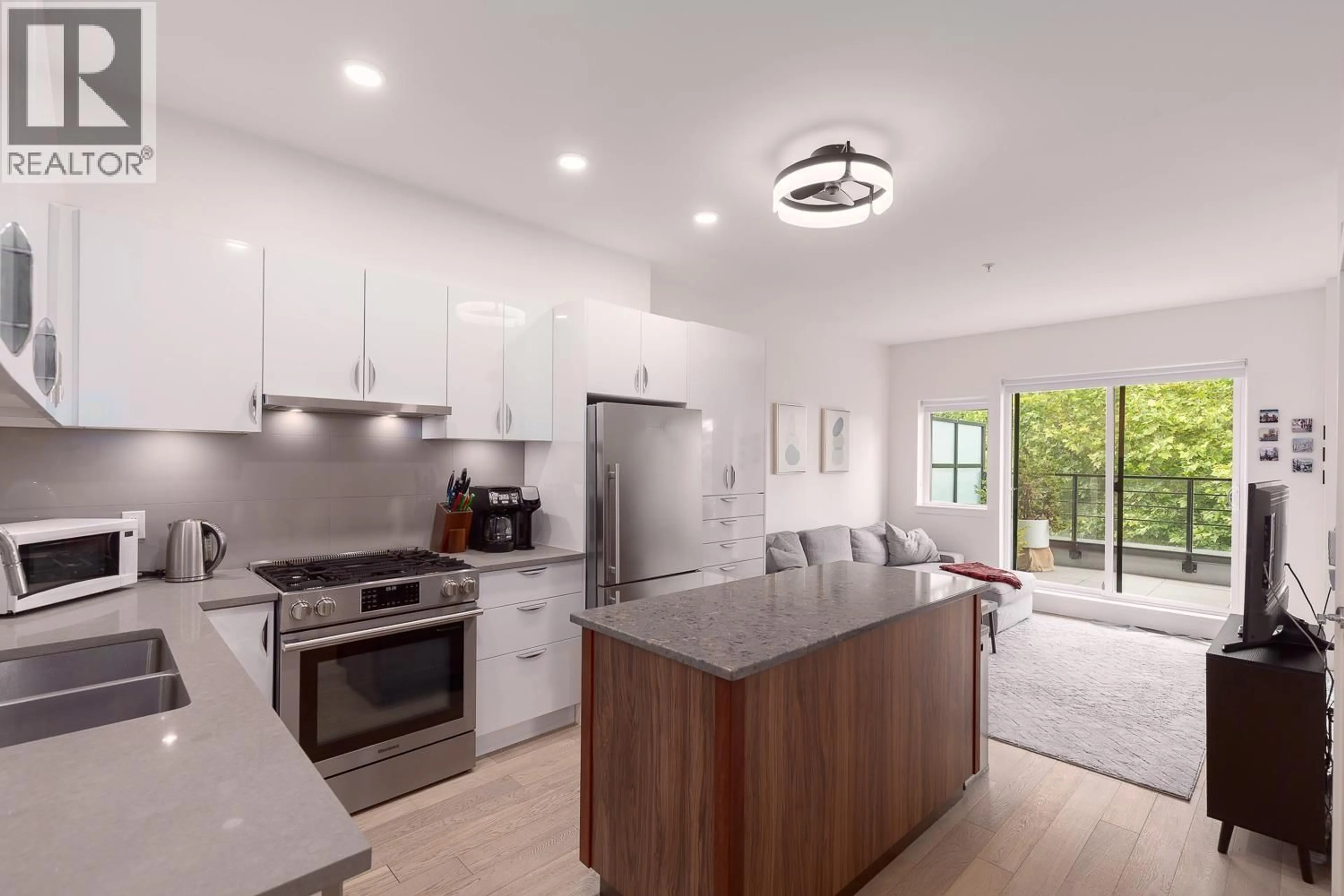 Open concept kitchen, unknown for 404 - 2666 DUKE STREET, Vancouver British Columbia V5R4S9