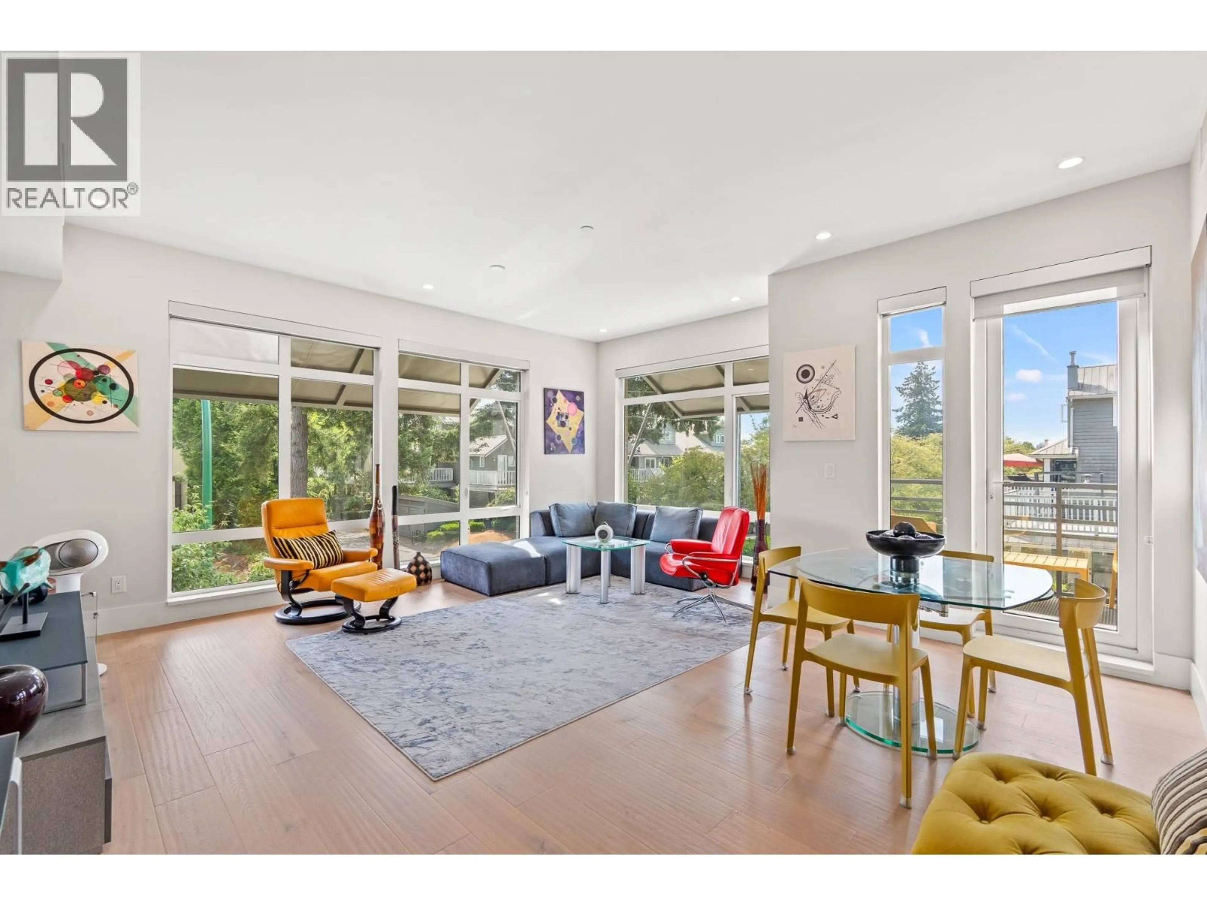 Living room with furniture, unknown for 202 - 1591 BOWSER AVENUE, North Vancouver British Columbia V7P2Y4