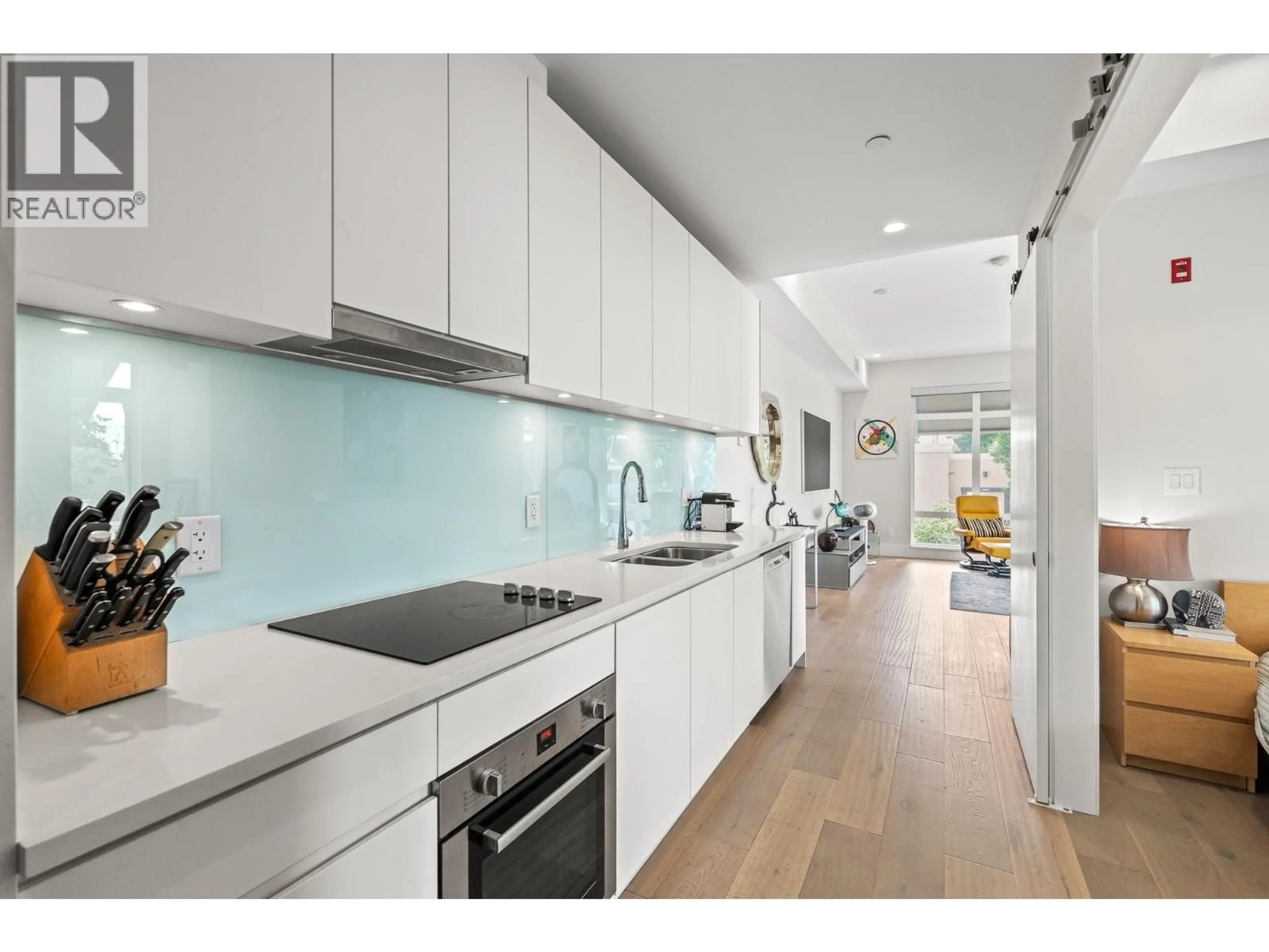 Open concept kitchen, unknown for 202 - 1591 BOWSER AVENUE, North Vancouver British Columbia V7P2Y4