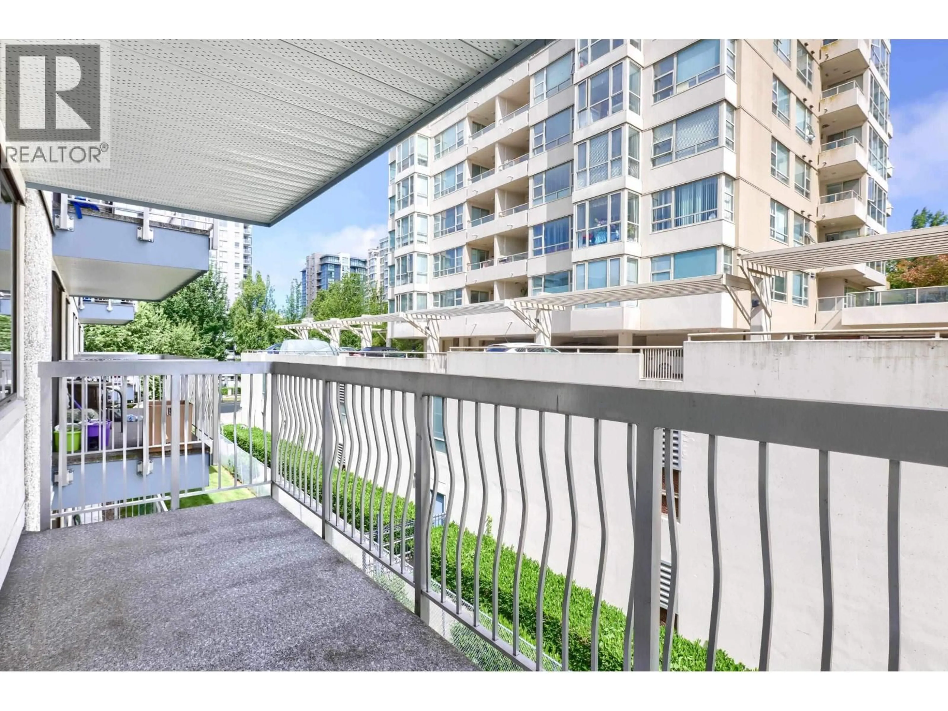 Balcony in the apartment, city buildings view from balcony for 208 - 6340 BUSWELL STREET, Richmond British Columbia V6Y2E9