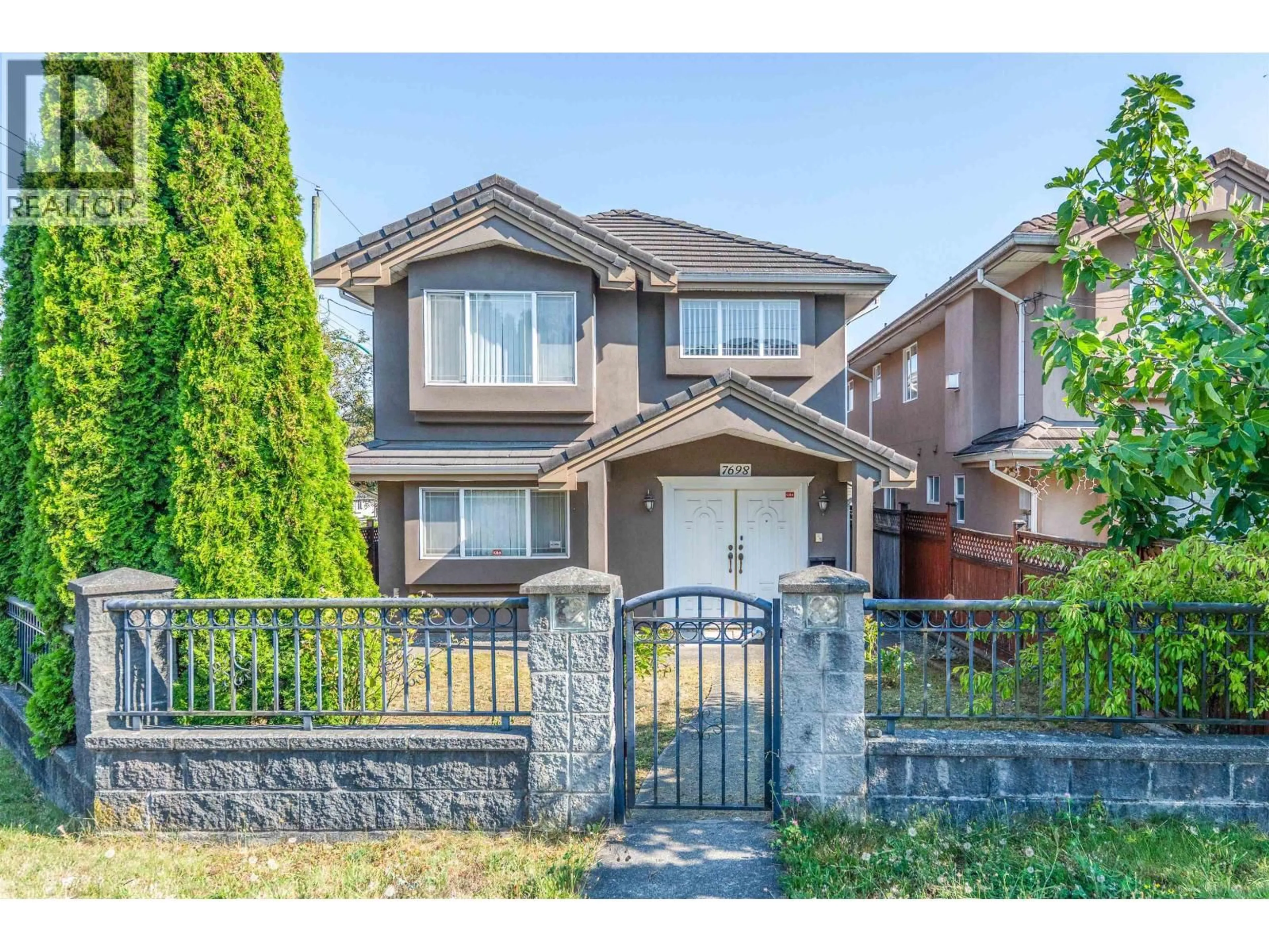 Home with brick exterior material, street for 7698 14TH AVENUE, Burnaby British Columbia V3N2A6