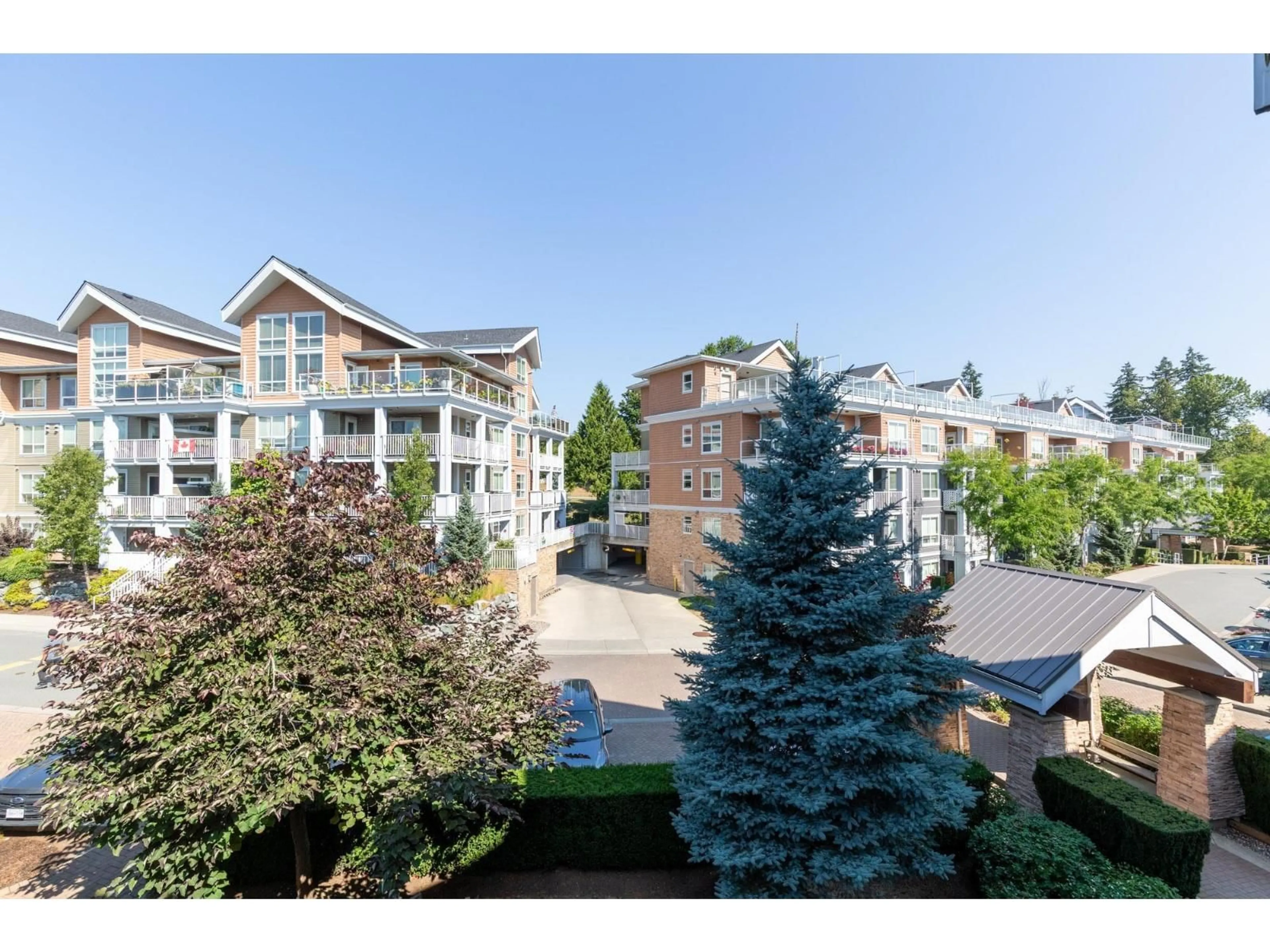 A pic from outside/outdoor area/front of a property/back of a property/a pic from drone, unknown for 307 - 6480 194 STREET, Surrey British Columbia V4N6J9