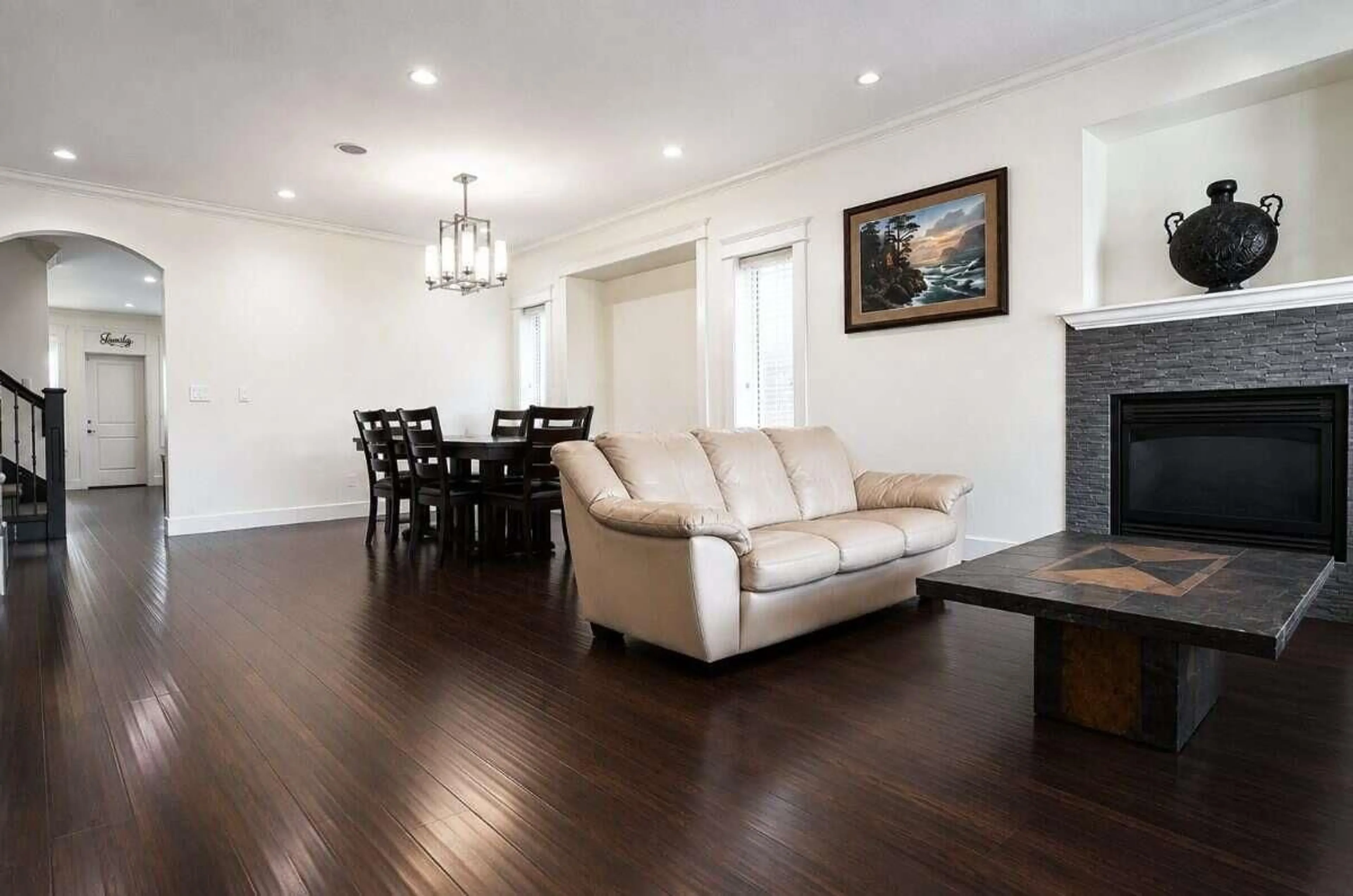 Living room with furniture, wood/laminate floor for 32746 LISSIMORE AVENUE, Mission British Columbia V2V7P5