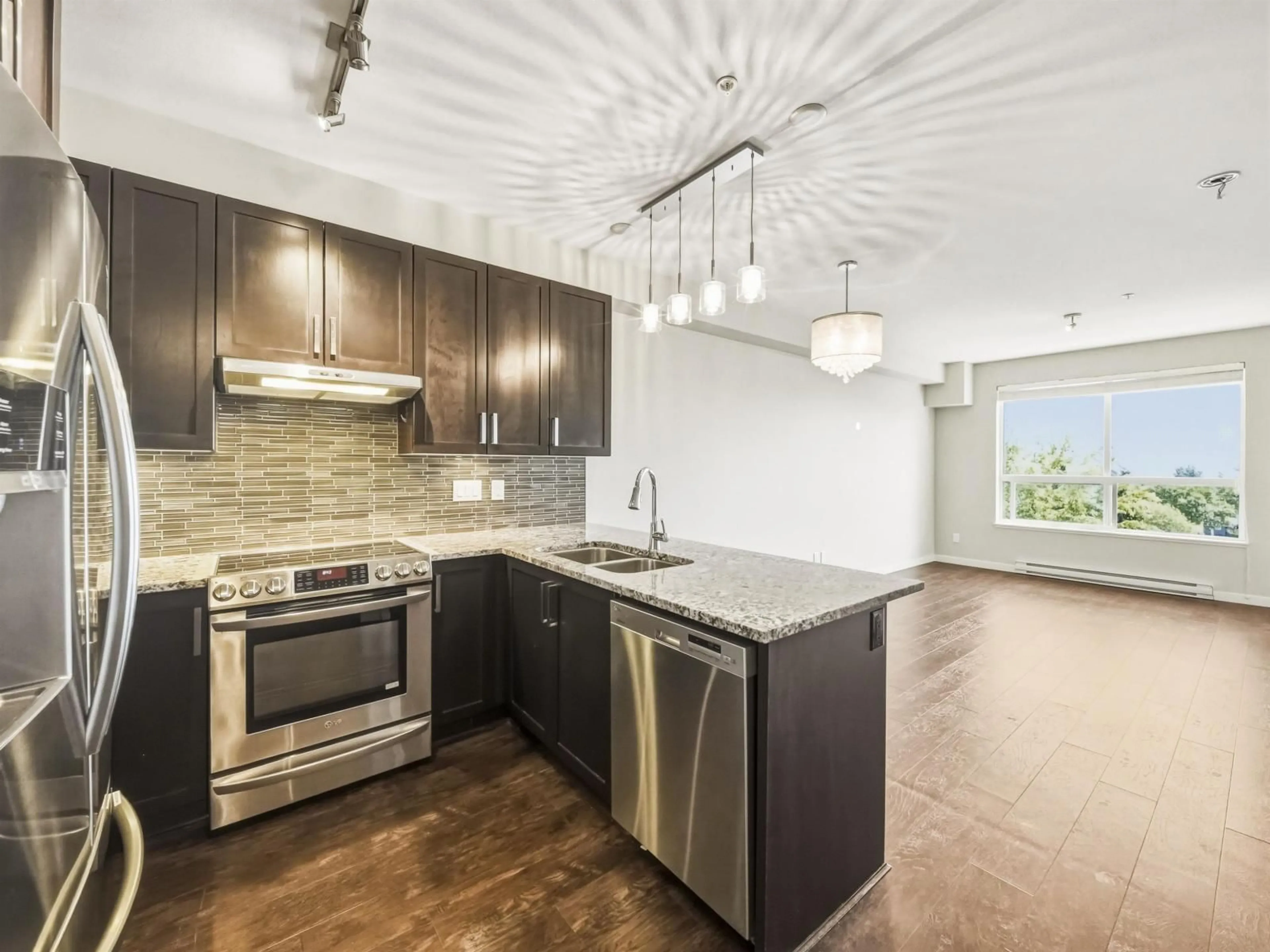Open concept kitchen, unknown for 319 - 6480 194 STREET, Surrey British Columbia V4N6J9