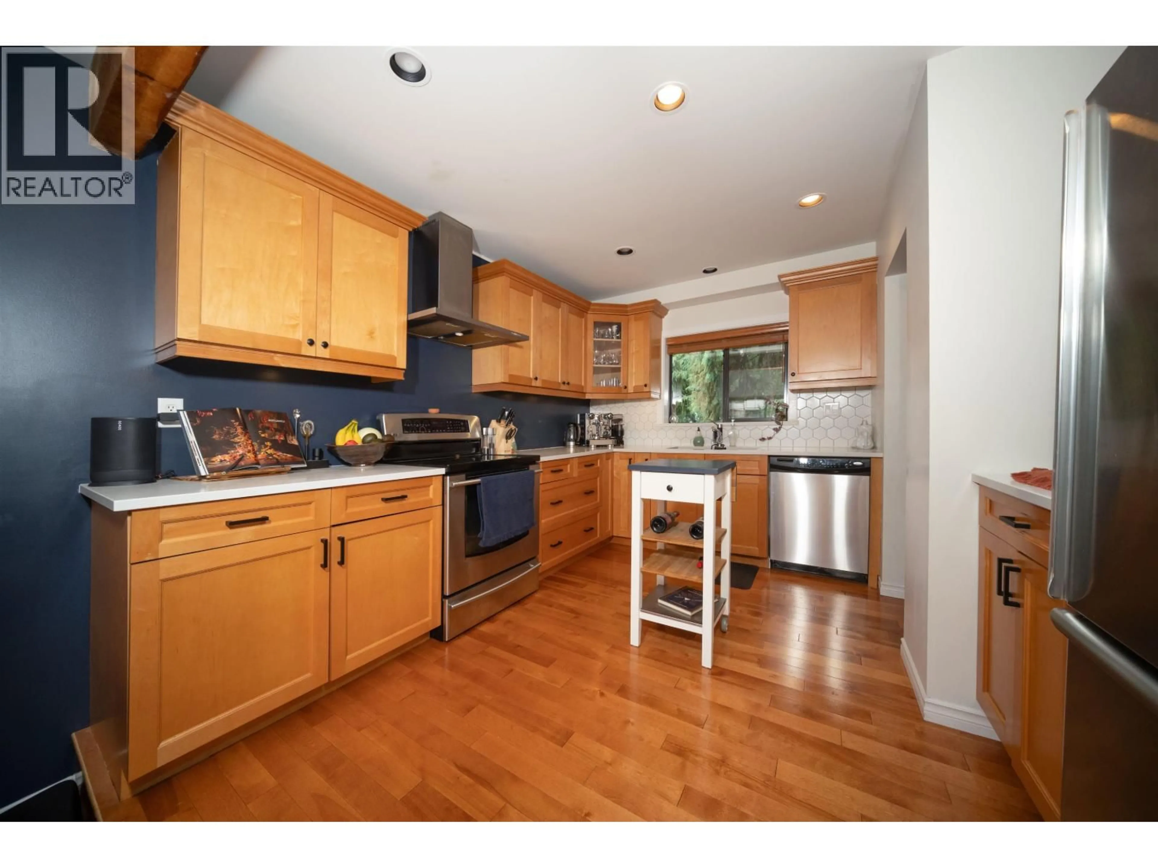 Open concept kitchen, wood/laminate floor for 8133 CEDAR SPRINGS ROAD, Whistler British Columbia V8E0G2
