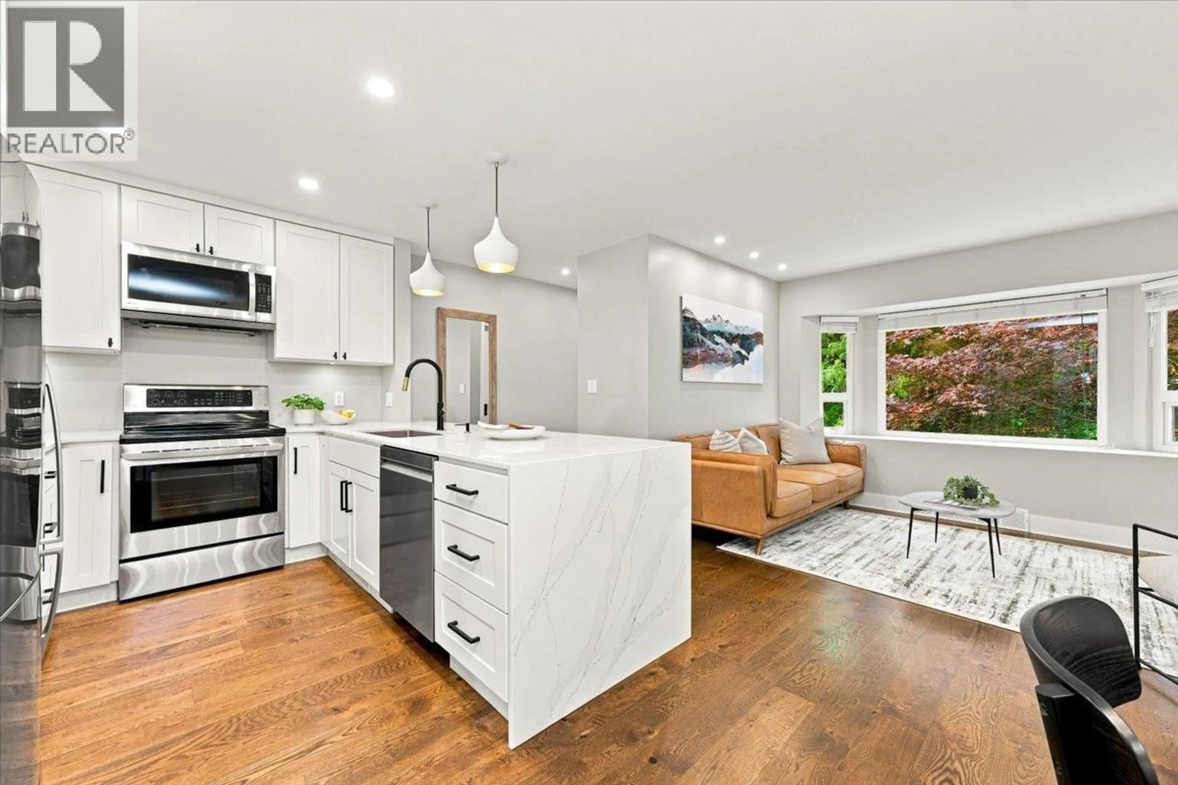 Open concept kitchen, unknown for 223 19TH STREET, North Vancouver British Columbia V7M1X6