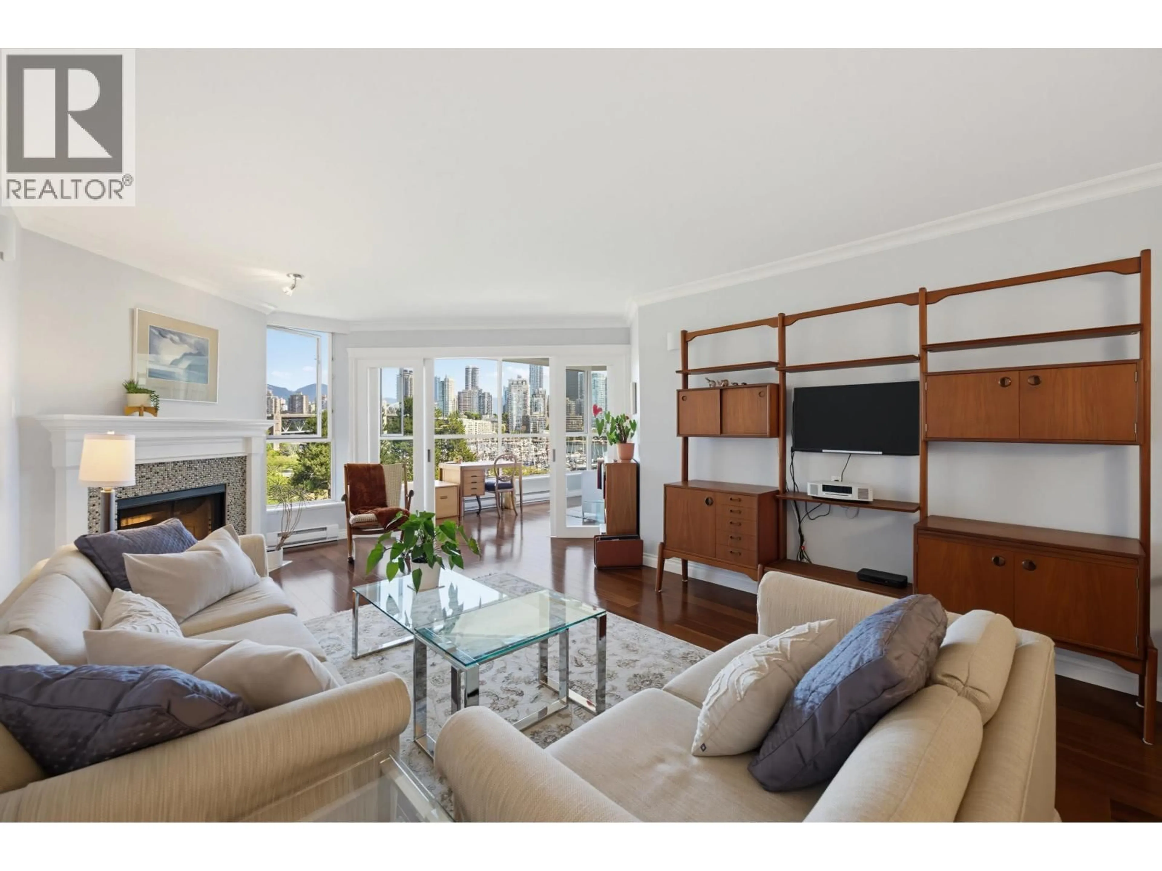 Living room with furniture, unknown for 304 - 1490 PENNYFARTHING DRIVE, Vancouver British Columbia V6J4Z3