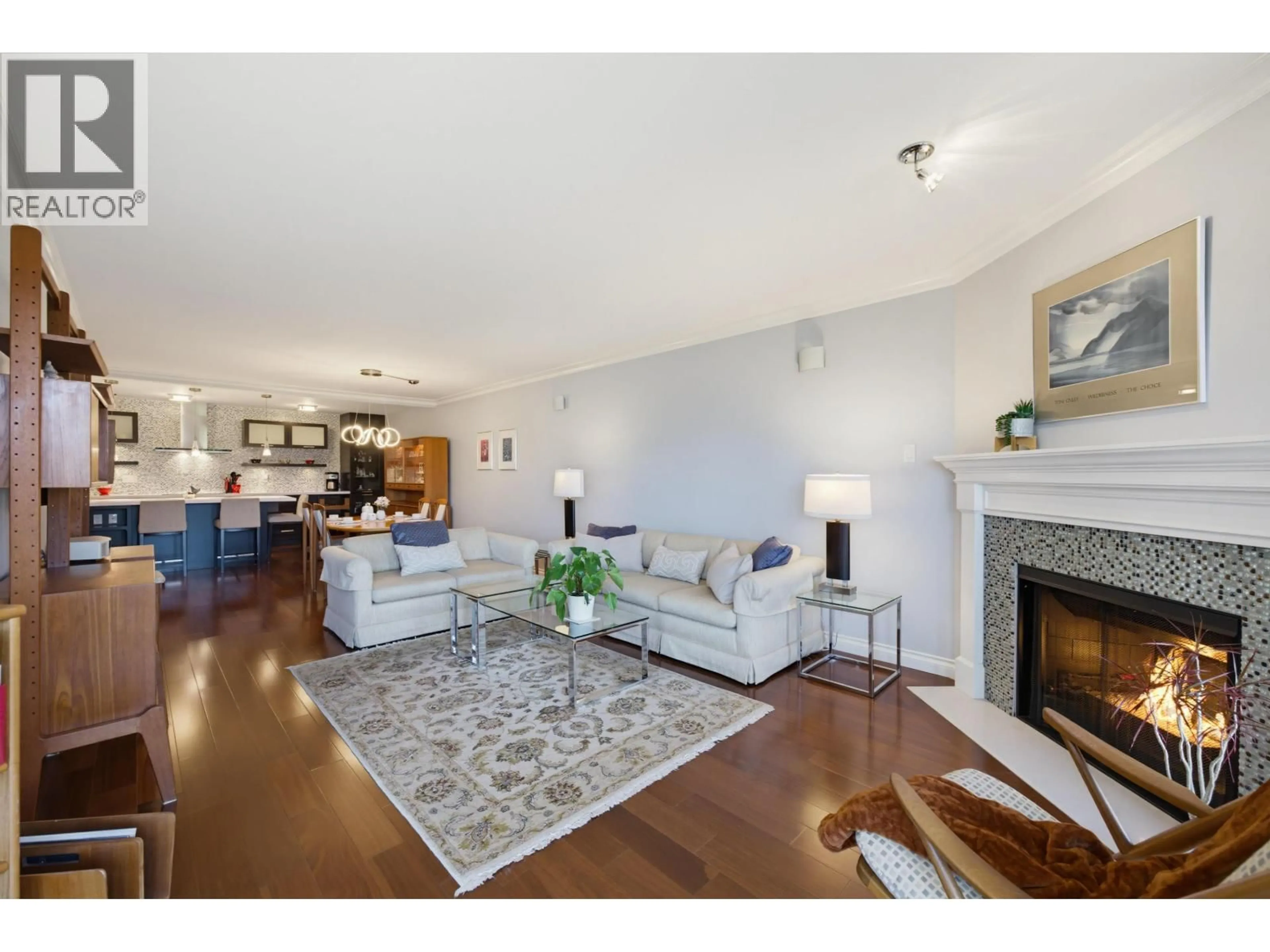 Living room with furniture, unknown for 304 - 1490 PENNYFARTHING DRIVE, Vancouver British Columbia V6J4Z3
