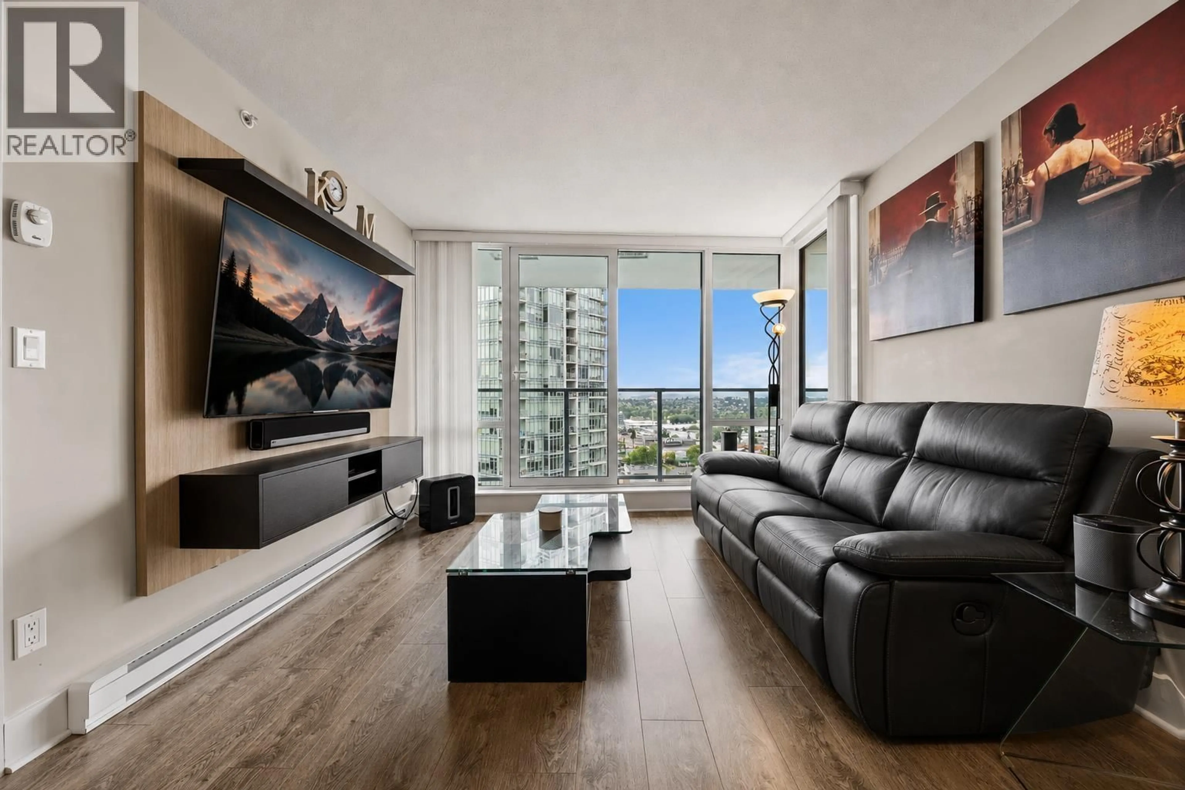 Living room with furniture, wood/laminate floor for 2205 - 4189 HALIFAX STREET, Burnaby British Columbia V5C0H9