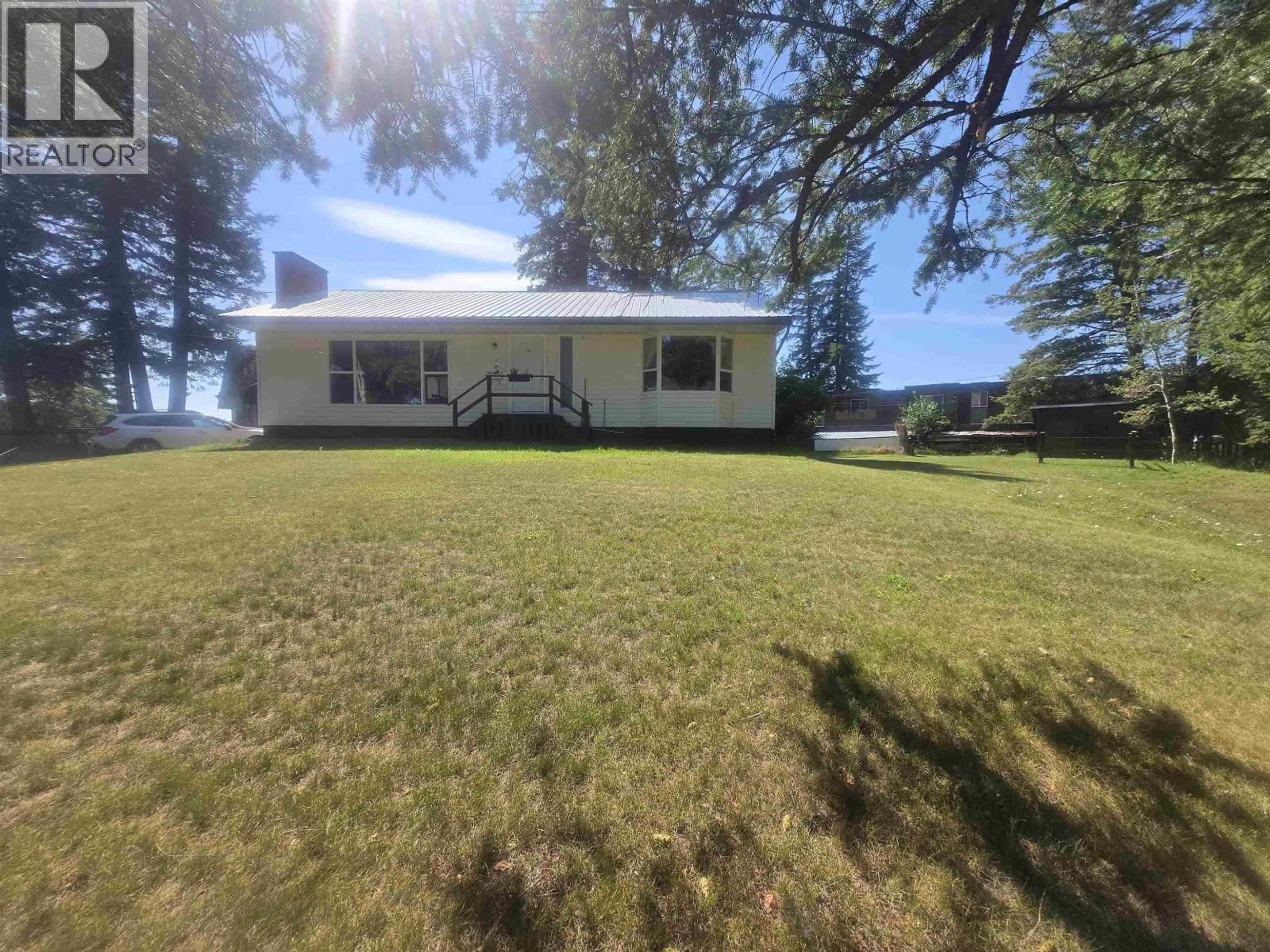 A pic from outside/outdoor area/front of a property/back of a property/a pic from drone, water/lake/river/ocean view for 777 CALLANAN STREET, Quesnel British Columbia V2J2V5