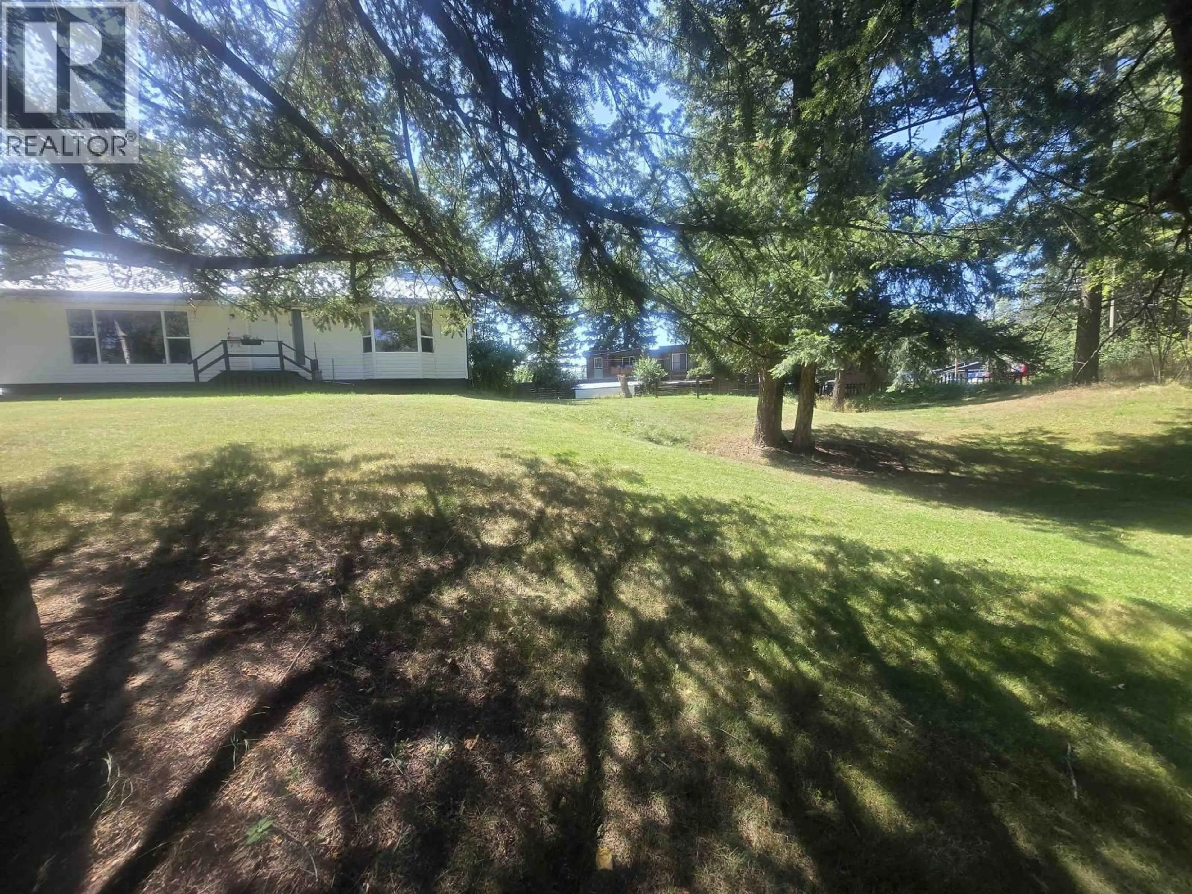 A pic from outside/outdoor area/front of a property/back of a property/a pic from drone, water/lake/river/ocean view for 777 CALLANAN STREET, Quesnel British Columbia V2J2V5