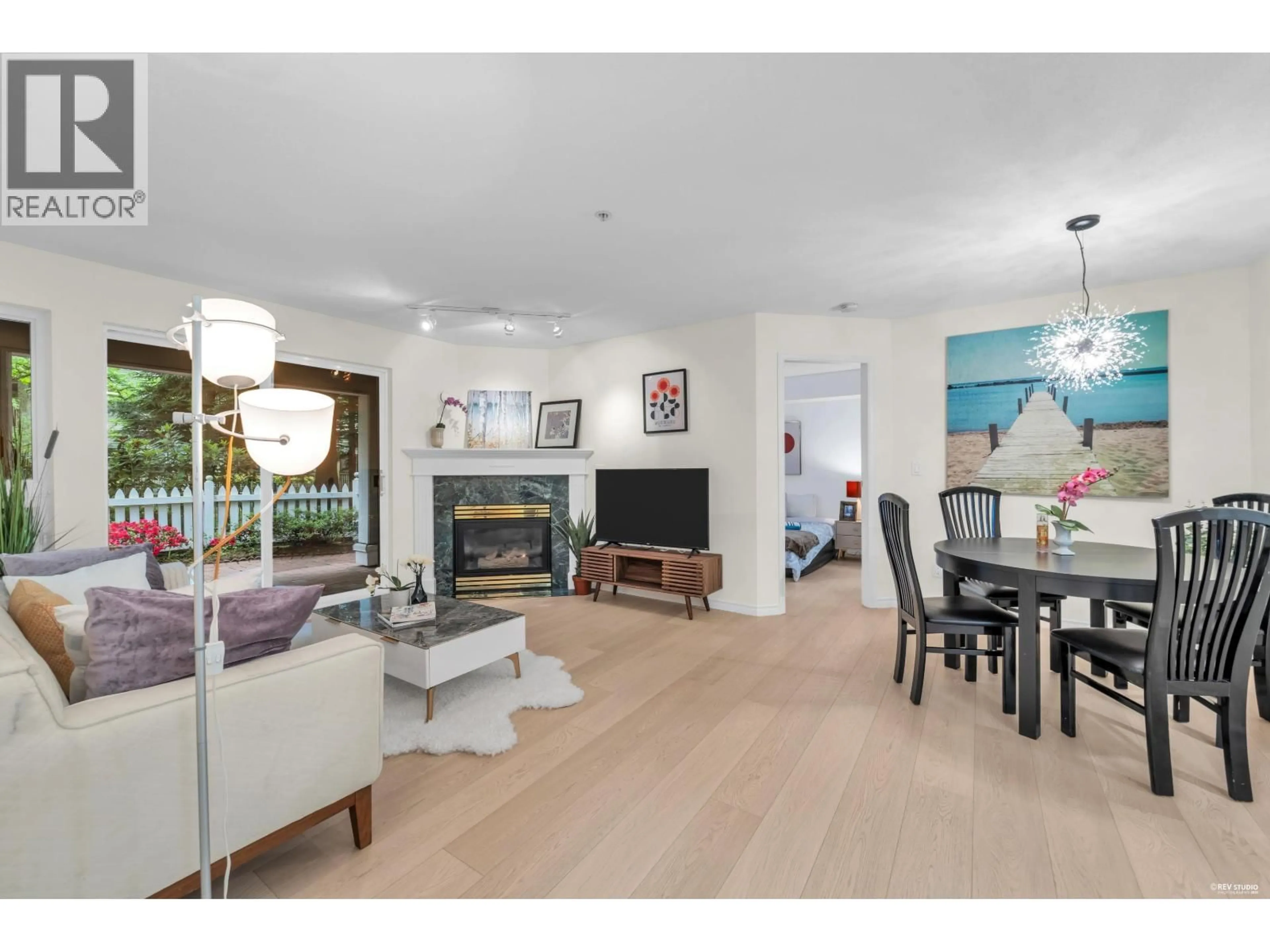 Living room with furniture, wood/laminate floor for 107 - 8100 JONES ROAD, Richmond British Columbia V6Y4B1