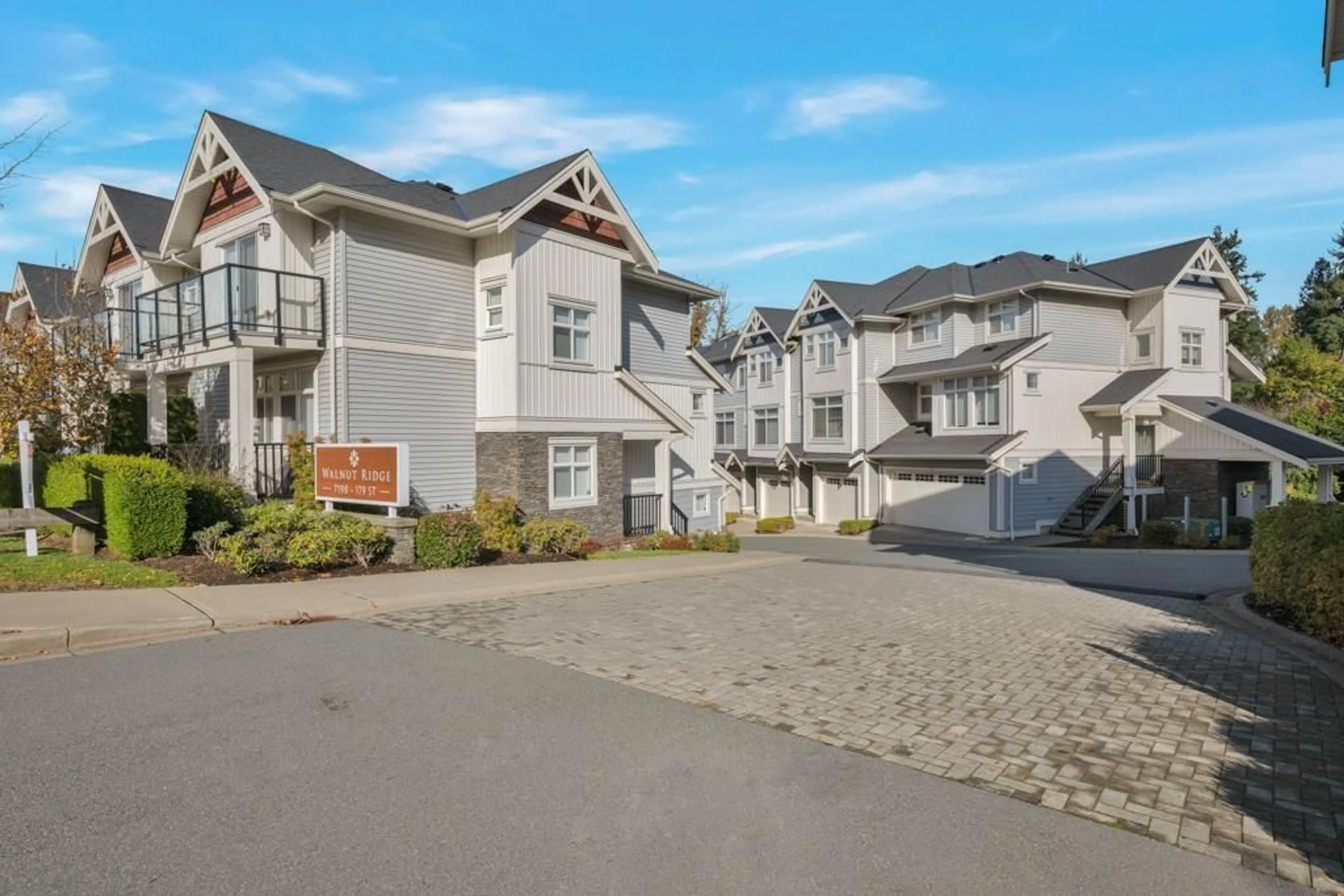 A pic from outside/outdoor area/front of a property/back of a property/a pic from drone, street for 15 - 7198 179 STREET, Surrey British Columbia V3S8C5