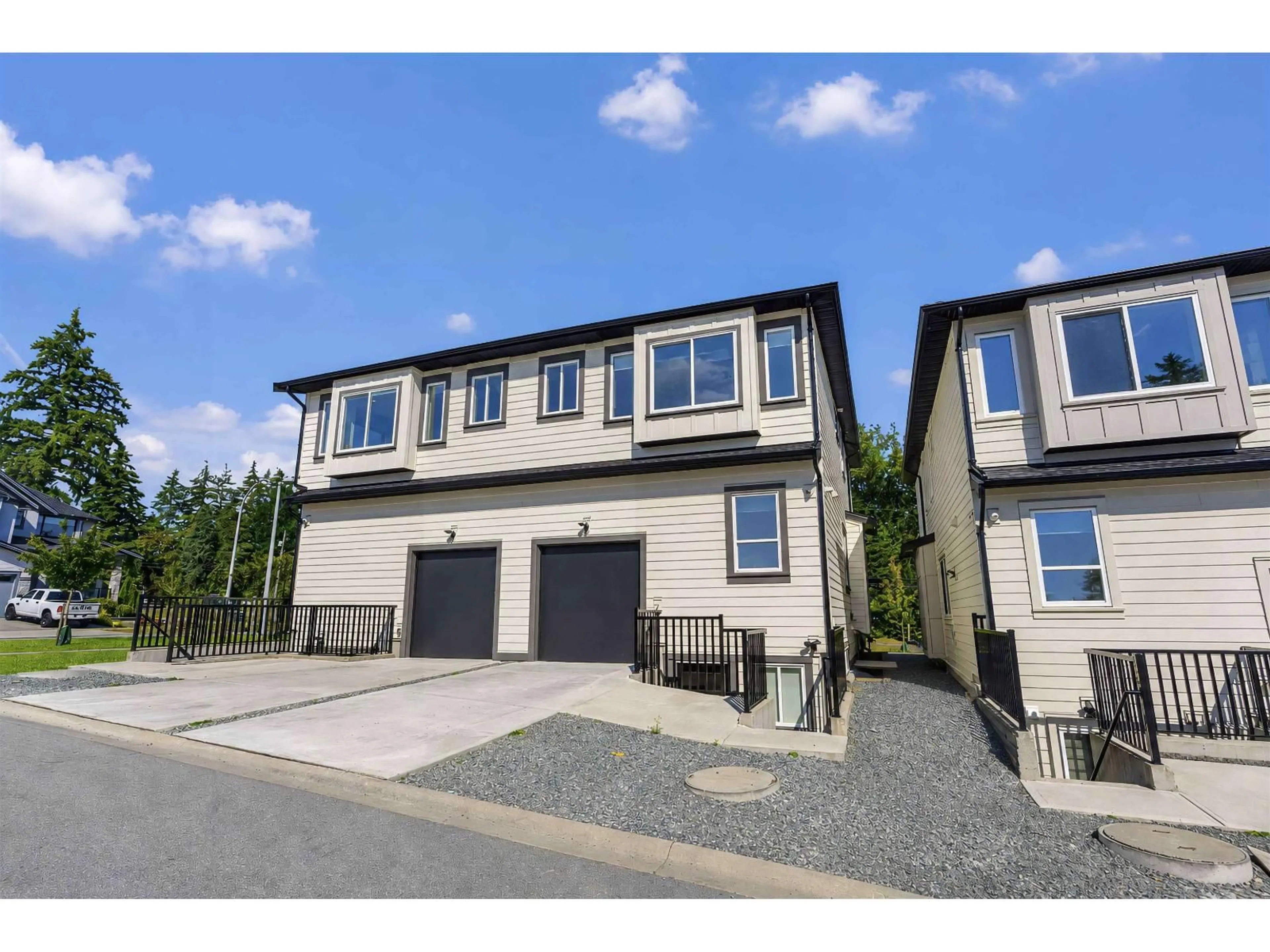 A pic from outside/outdoor area/front of a property/back of a property/a pic from drone, street for 2041 168 STREET, Surrey British Columbia V3Z1H1