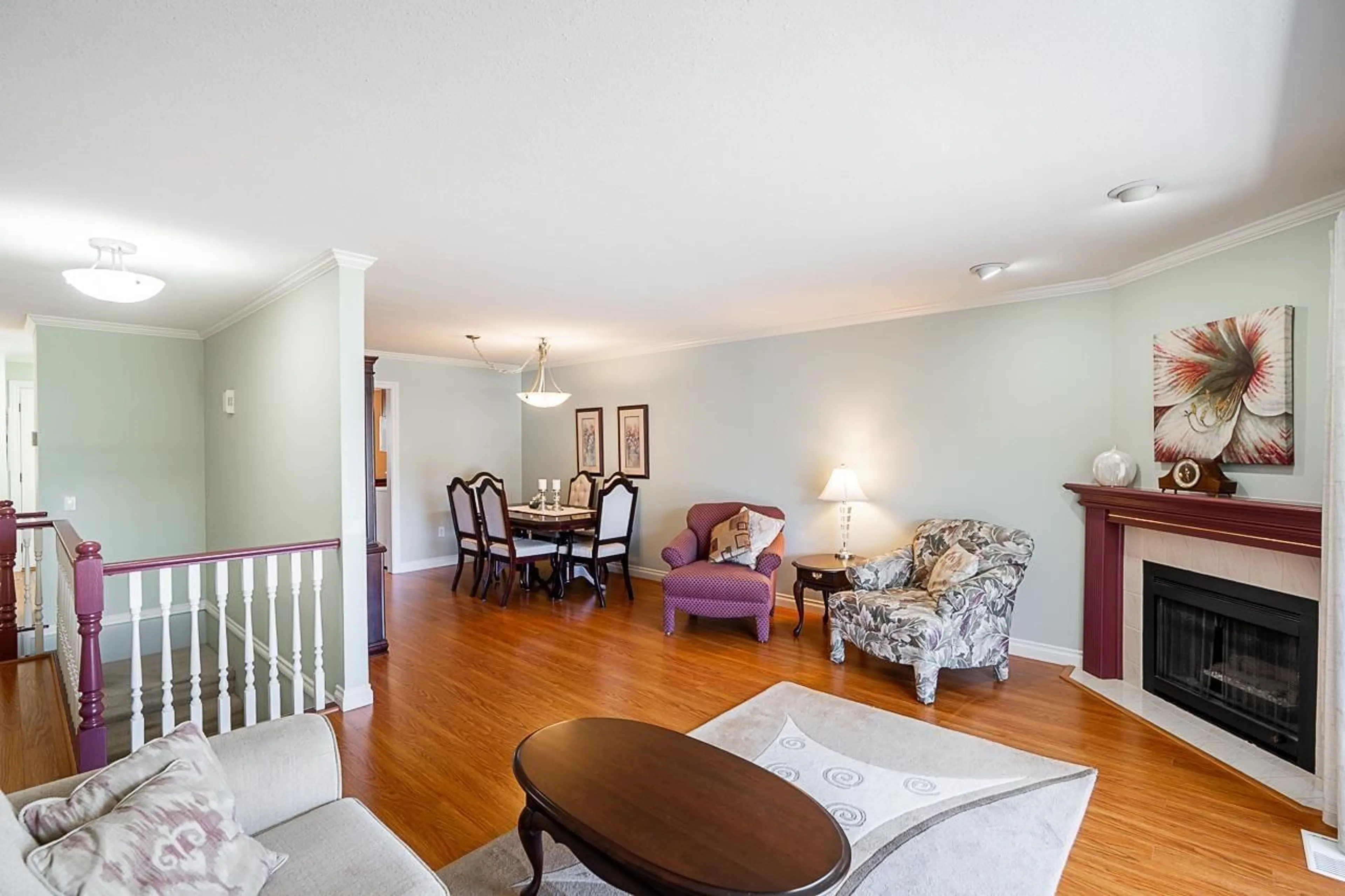 Living room with furniture, wood/laminate floor for 12 - 32615 MURRAY AVENUE, Abbotsford British Columbia V2T4T8