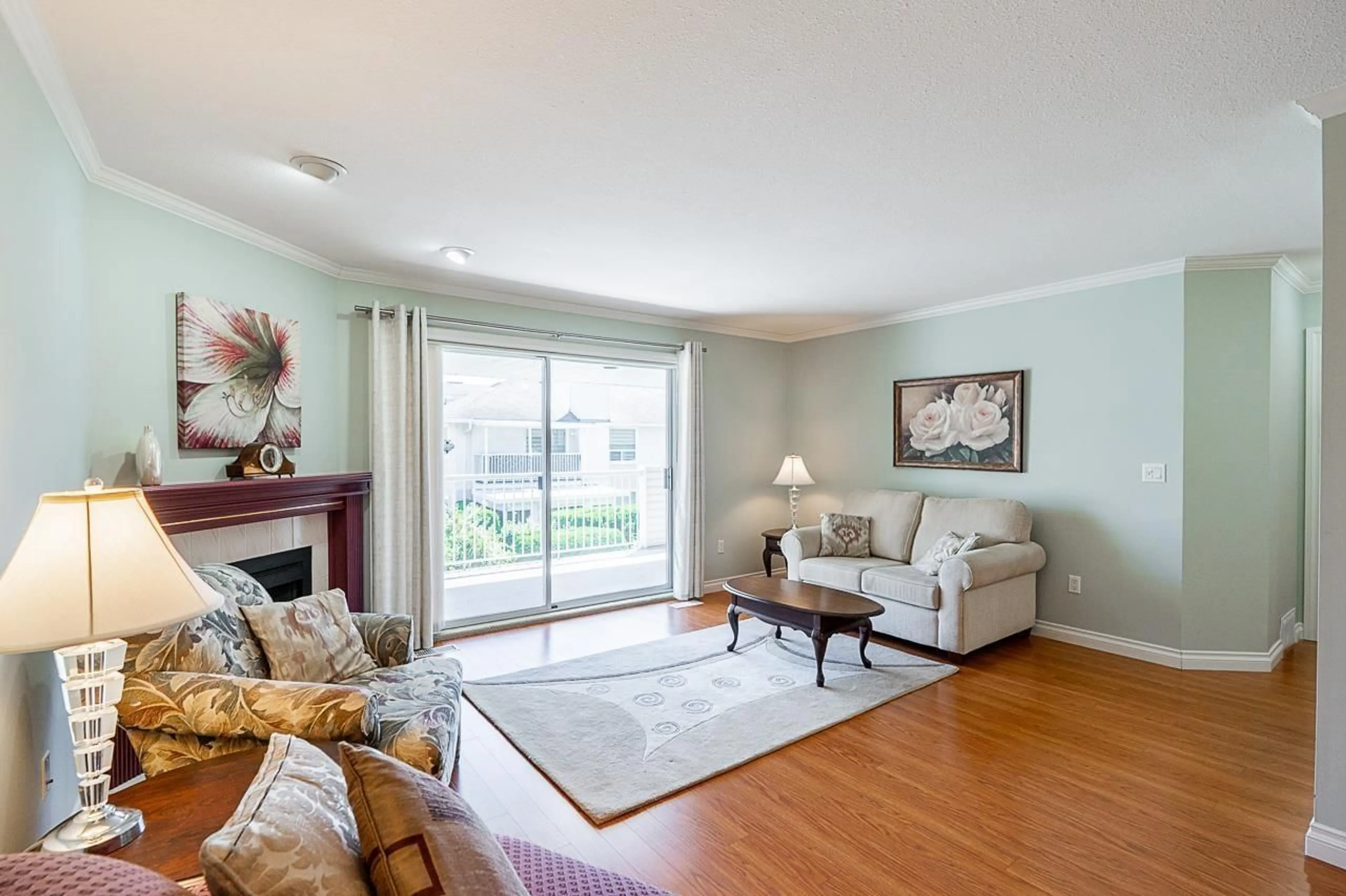 Living room with furniture, wood/laminate floor for 12 - 32615 MURRAY AVENUE, Abbotsford British Columbia V2T4T8