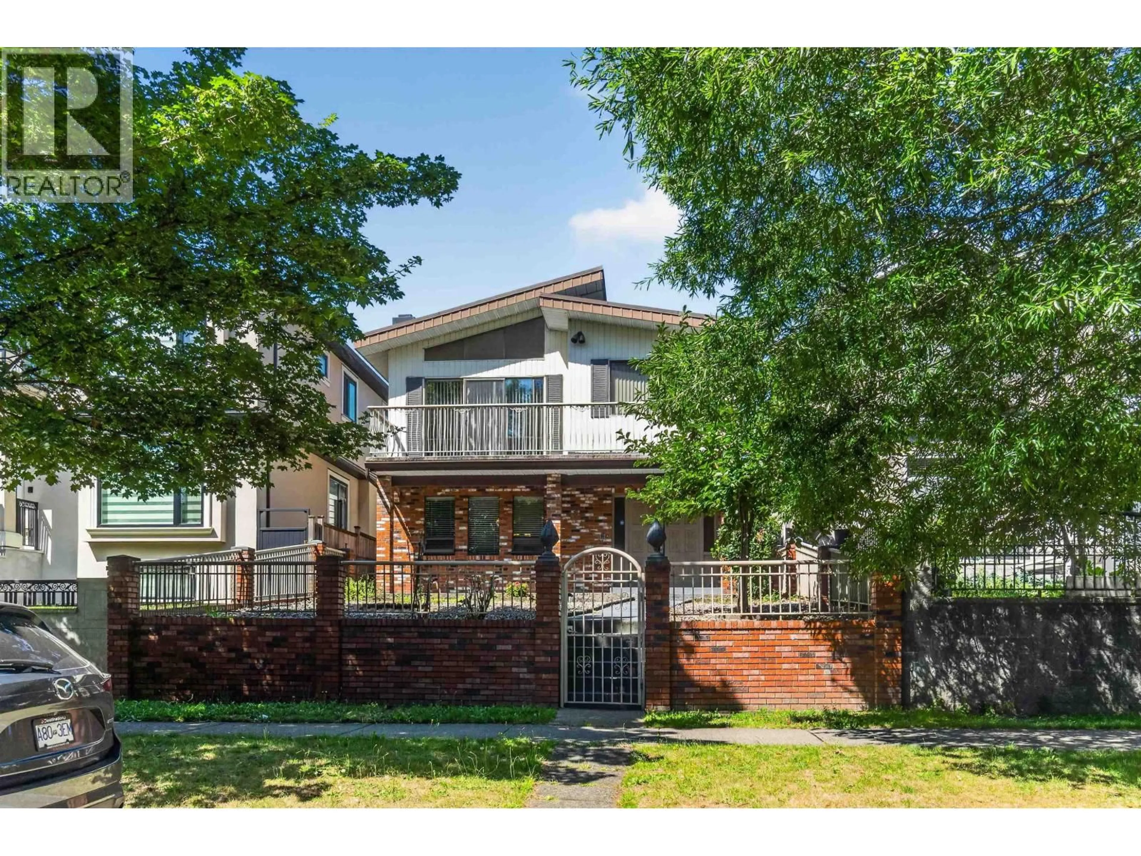 Home with brick exterior material, street for 2739 E 8TH AVENUE, Vancouver British Columbia V5M1W7