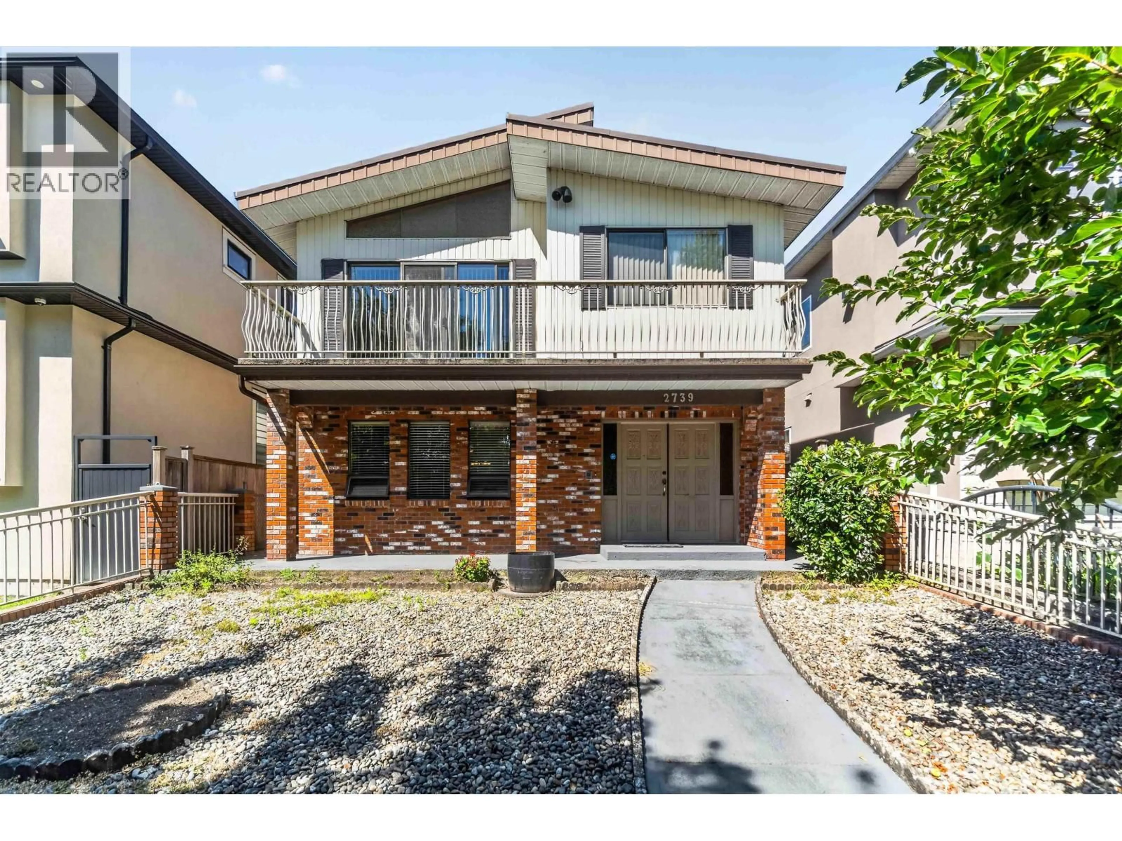 Home with brick exterior material, street for 2739 E 8TH AVENUE, Vancouver British Columbia V5M1W7