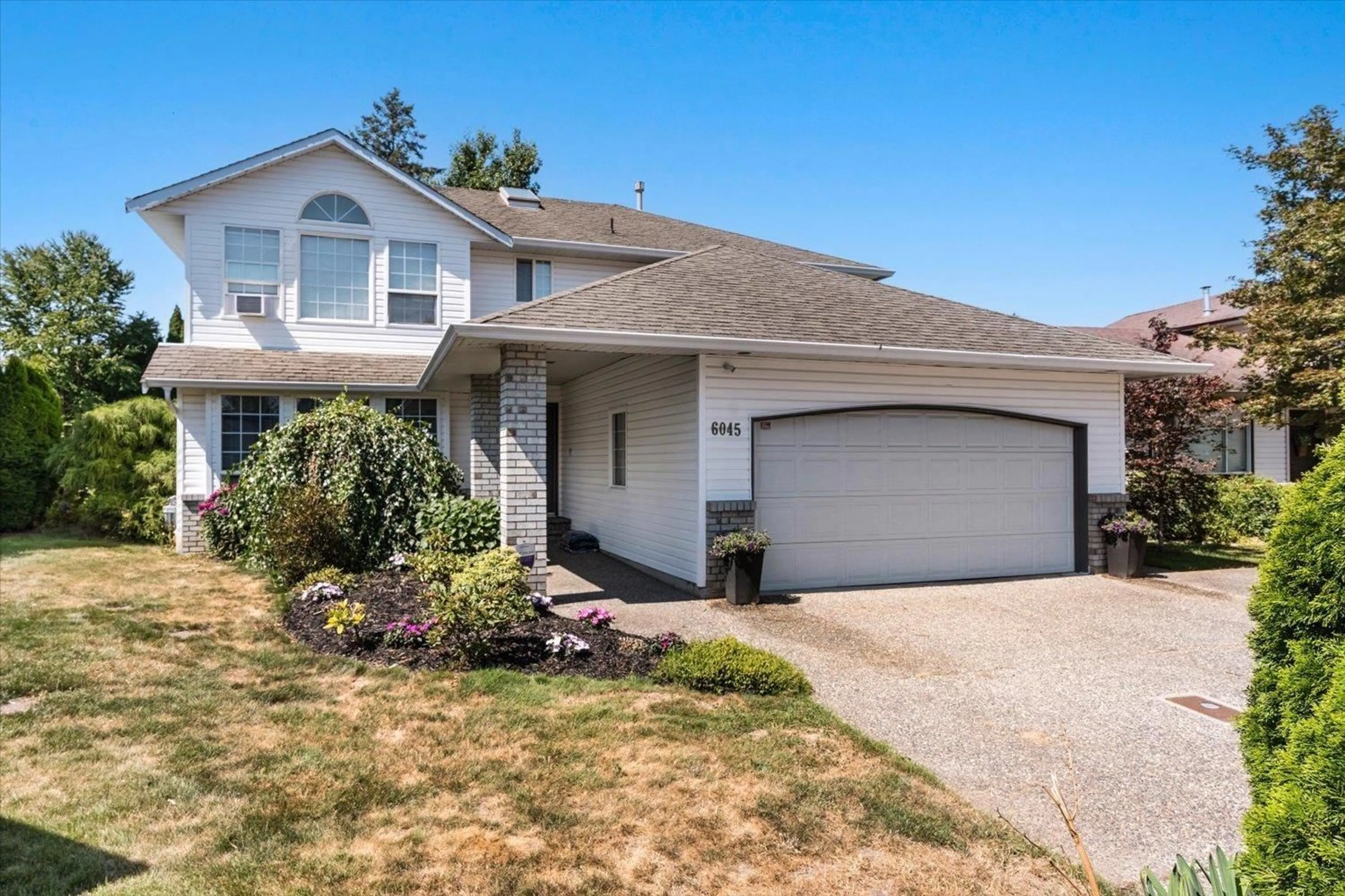 Home with vinyl exterior material, street for 6045 GLENROY DRIVE, Chilliwack British Columbia V2R2H8