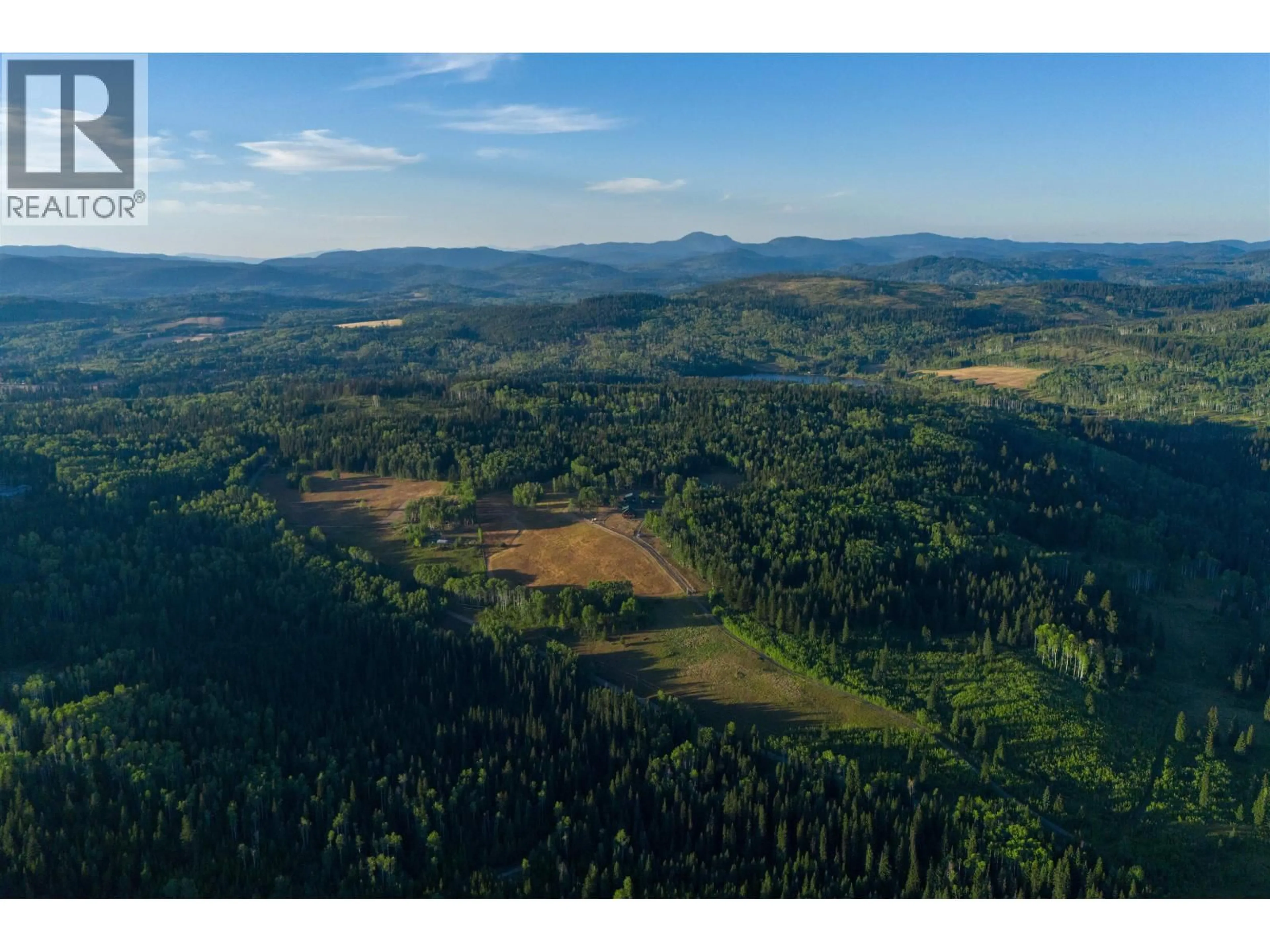 A pic from outside/outdoor area/front of a property/back of a property/a pic from drone, unknown for 7915 MACHETE LAKE ROAD, Bridge Lake British Columbia V0K1E0
