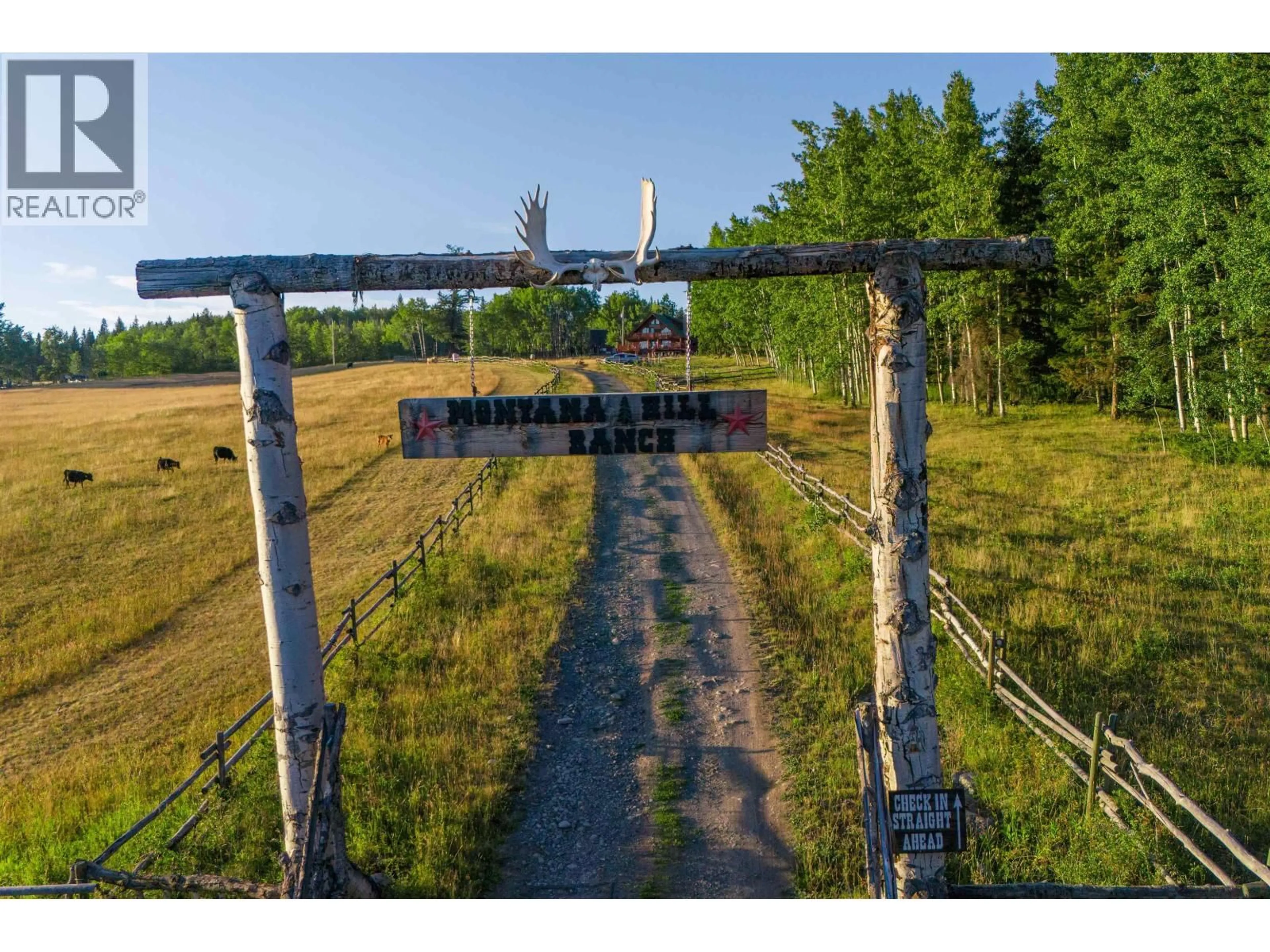 A pic from outside/outdoor area/front of a property/back of a property/a pic from drone, unknown for 7915 MACHETE LAKE ROAD, Bridge Lake British Columbia V0K1E0