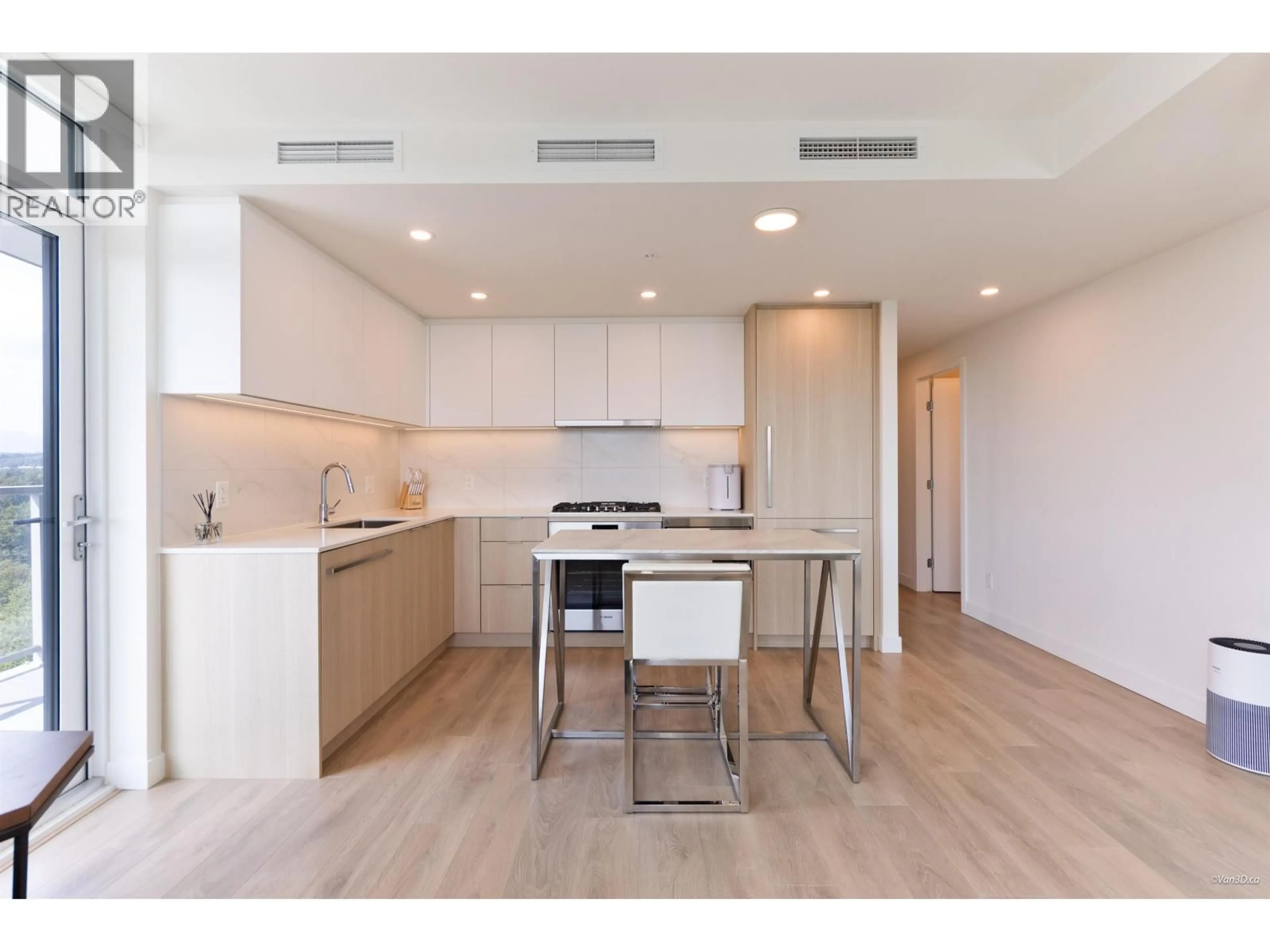 Open concept kitchen, wood/laminate floor for 1502 - 308 ALDERSON AVENUE, Coquitlam British Columbia V3K0J2