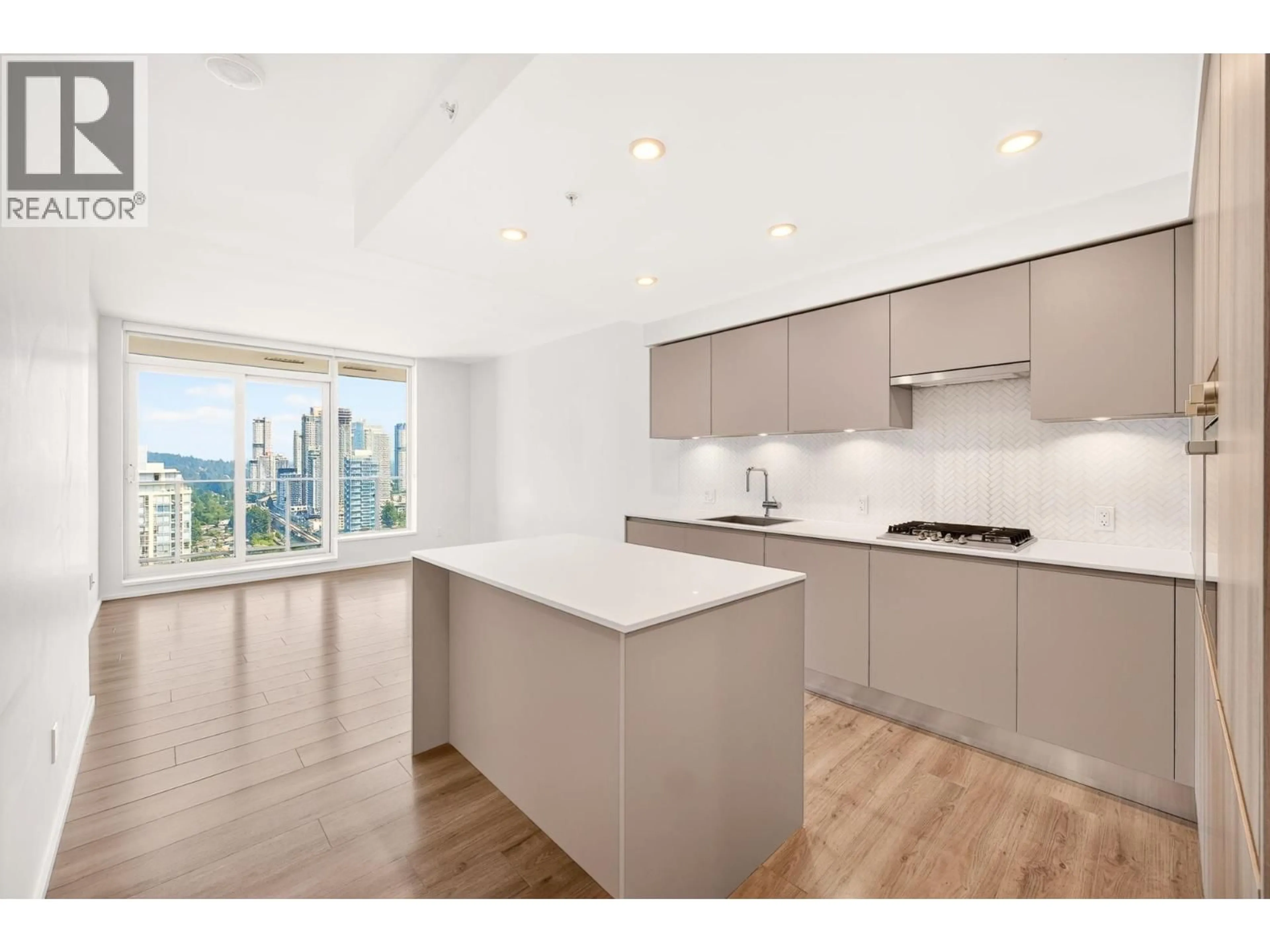 Open concept kitchen, wood/laminate floor for 3411 - 3809 EVERGREEN PLACE, Burnaby British Columbia V3J0M1