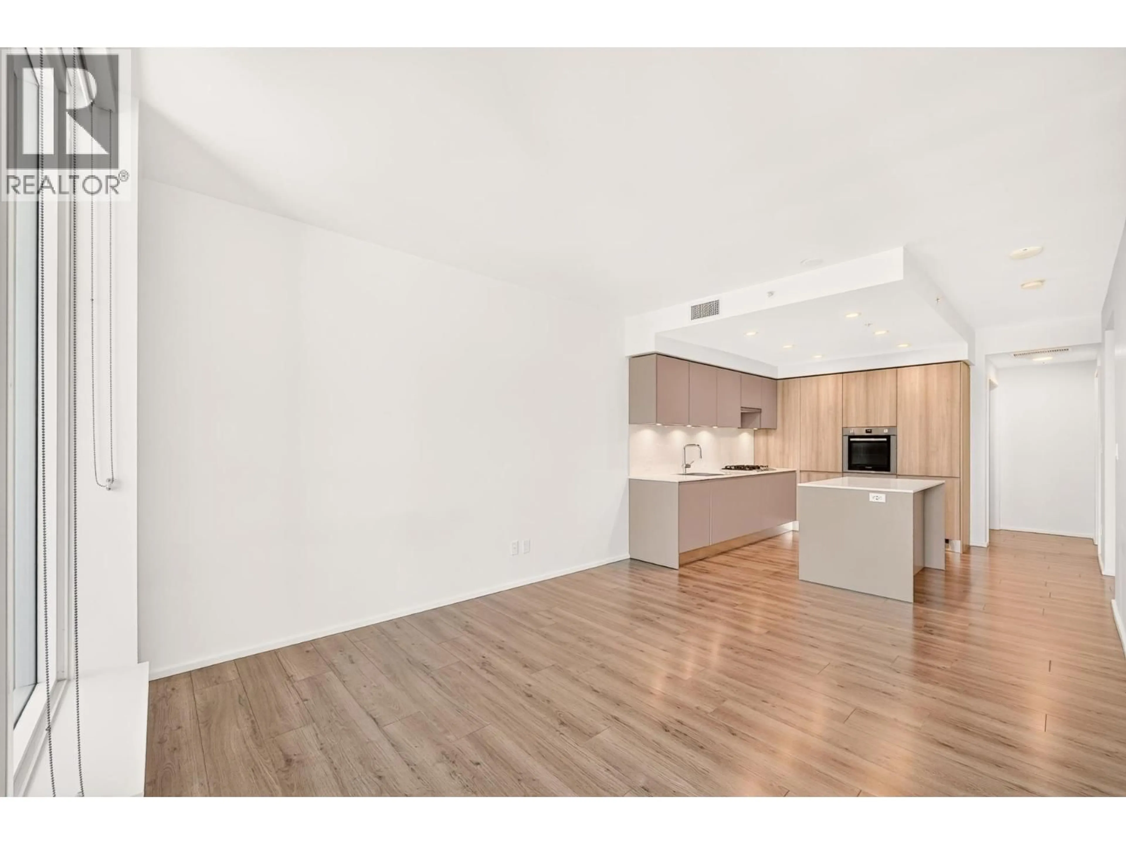 Open concept kitchen, wood/laminate floor for 3411 - 3809 EVERGREEN PLACE, Burnaby British Columbia V3J0M1