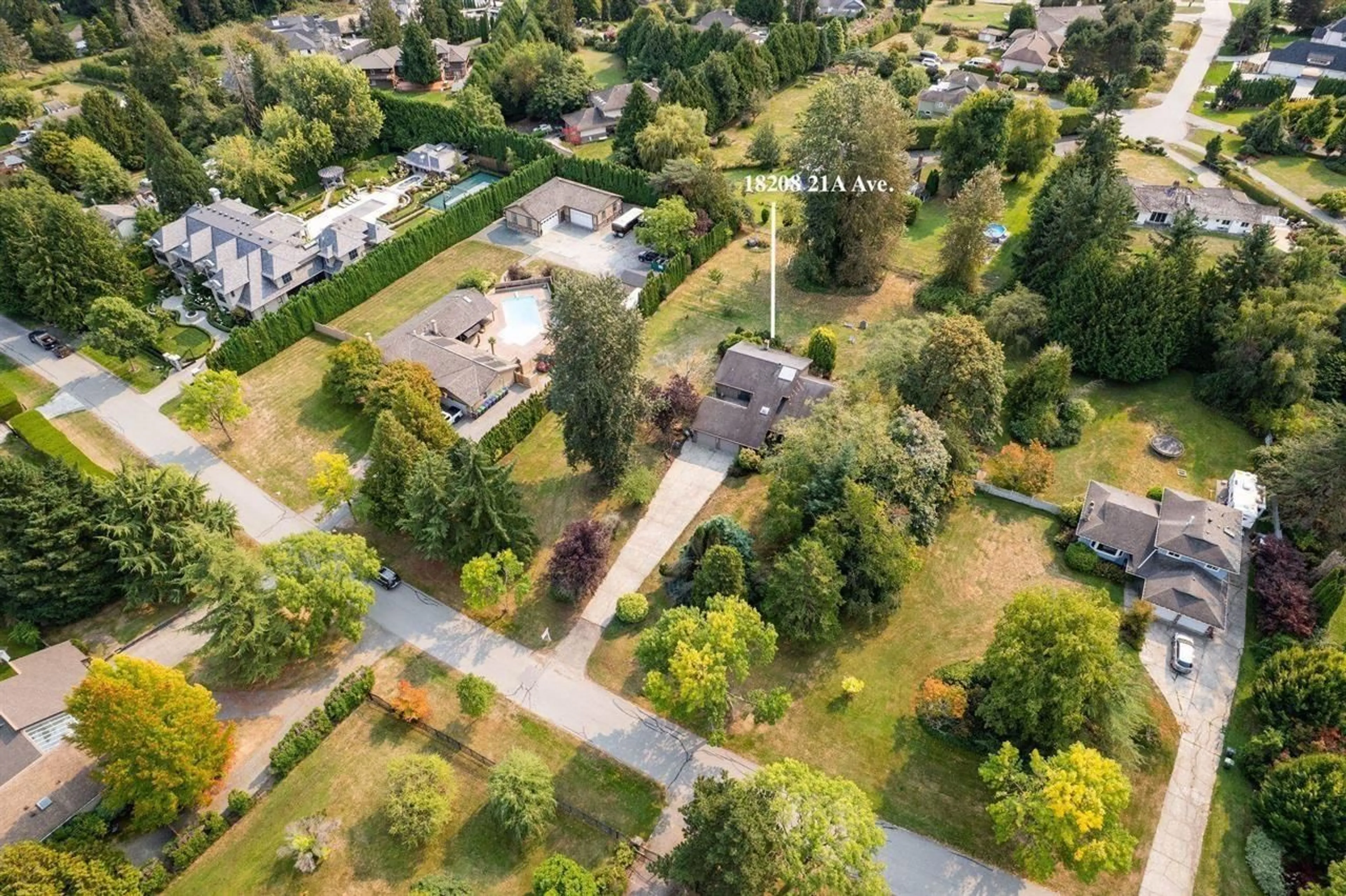 A pic from outside/outdoor area/front of a property/back of a property/a pic from drone, street for 18208 21A AVENUE, Surrey British Columbia V3Z9W2