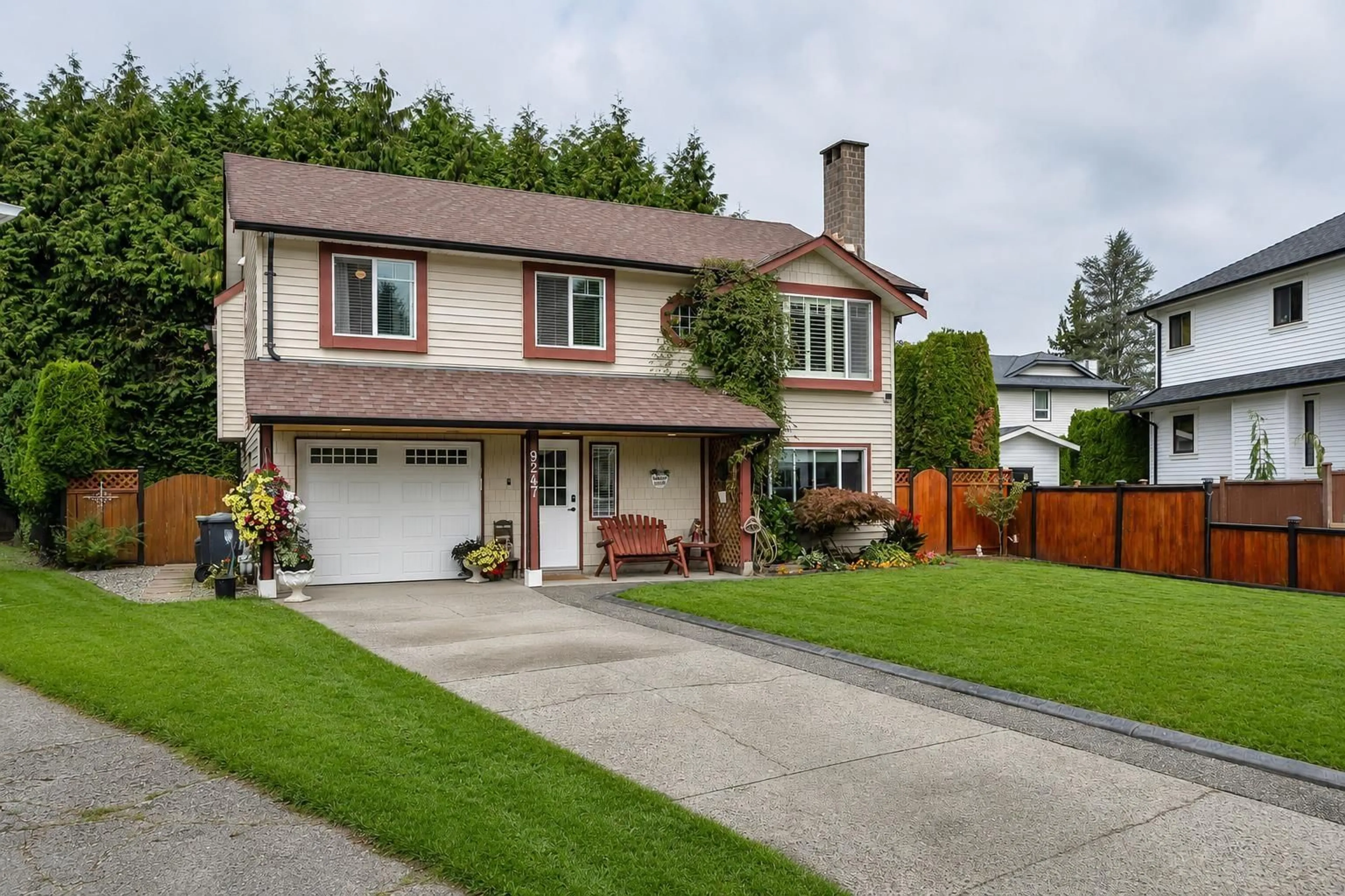 Home with vinyl exterior material, street for 9247 214 STREET, Langley British Columbia V1M1P4